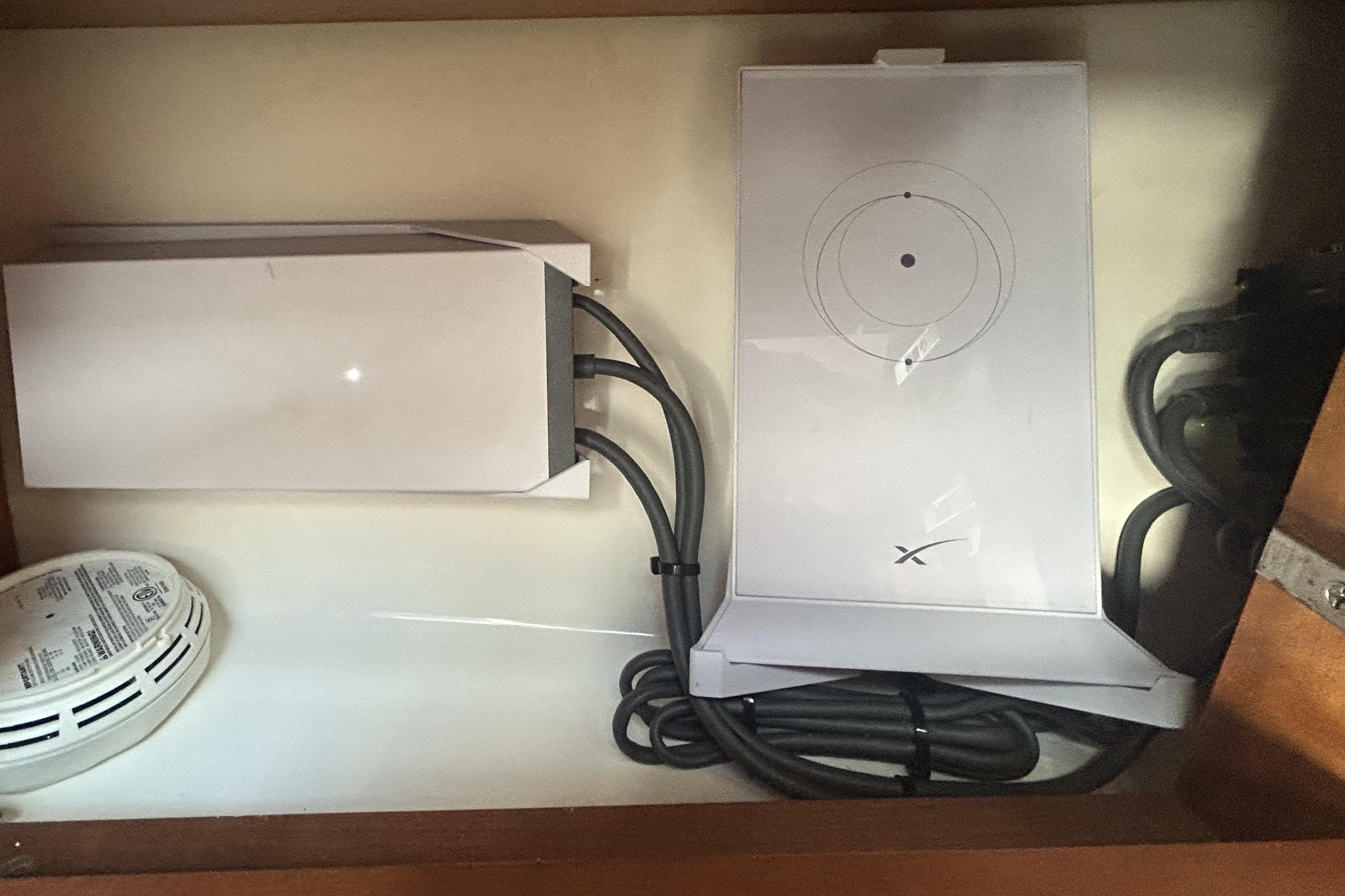 Electrical components and wiring inside a 2018 Albemarle 29 Express boat compartment.