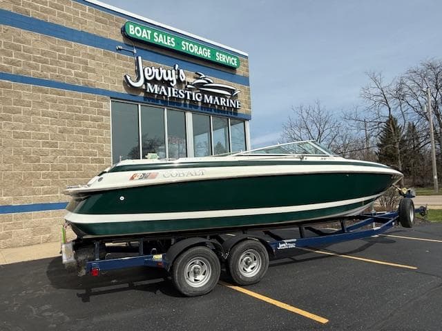 1995 Cobalt 252 boat on trailer at Jerry's Majestic Marine dealership.