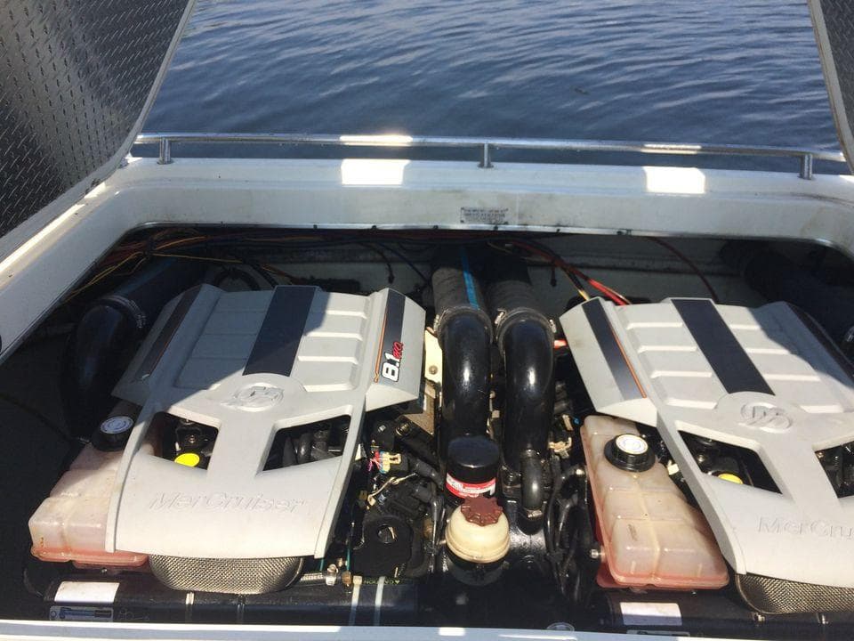 Twin MerCruiser engines in a 1988 Fountain 12 Meter boat, open engine compartment view.