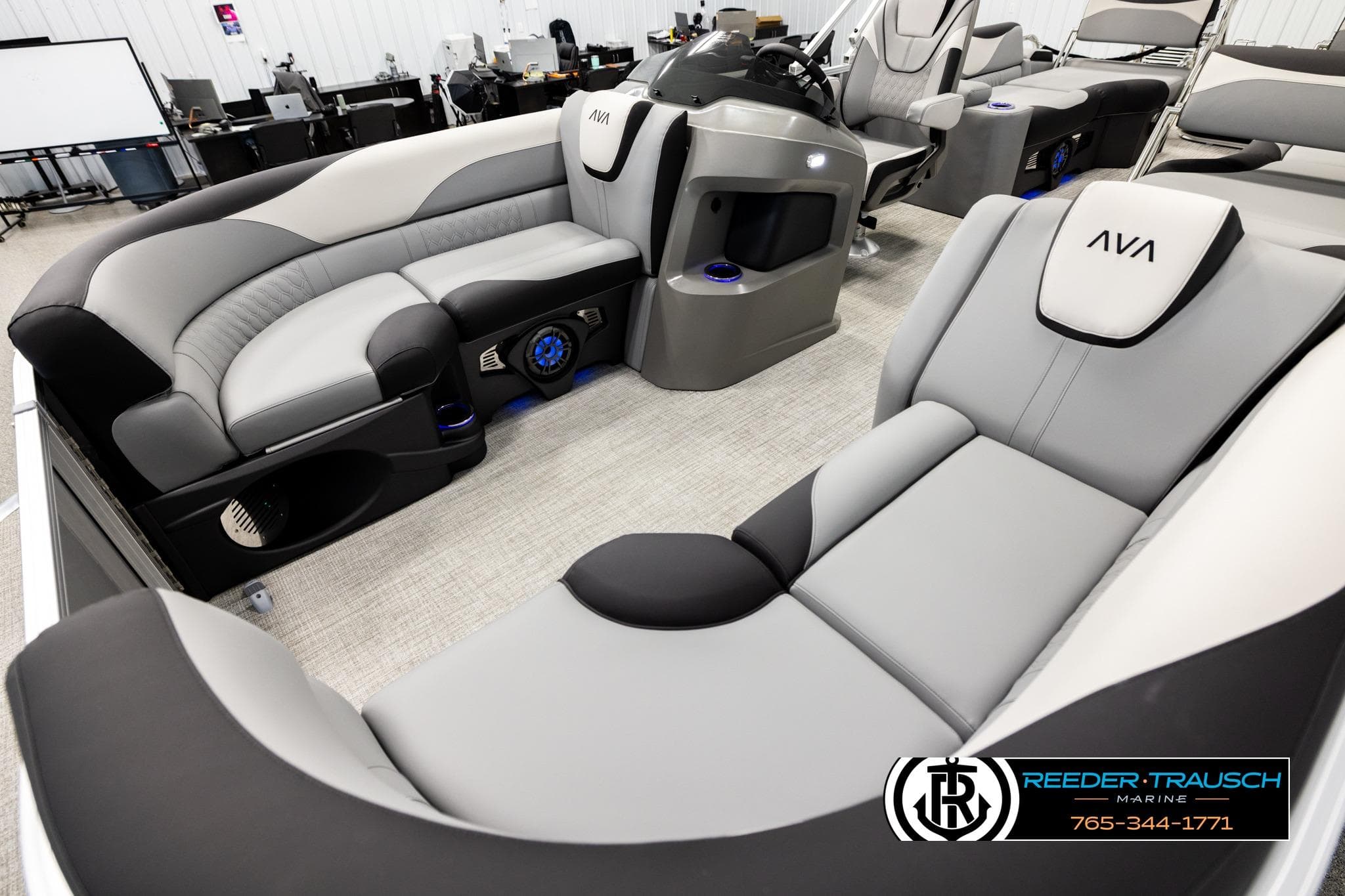 Luxurious interior of 2026 Avalon LSZ QLS pontoon boat with plush seating and modern design.