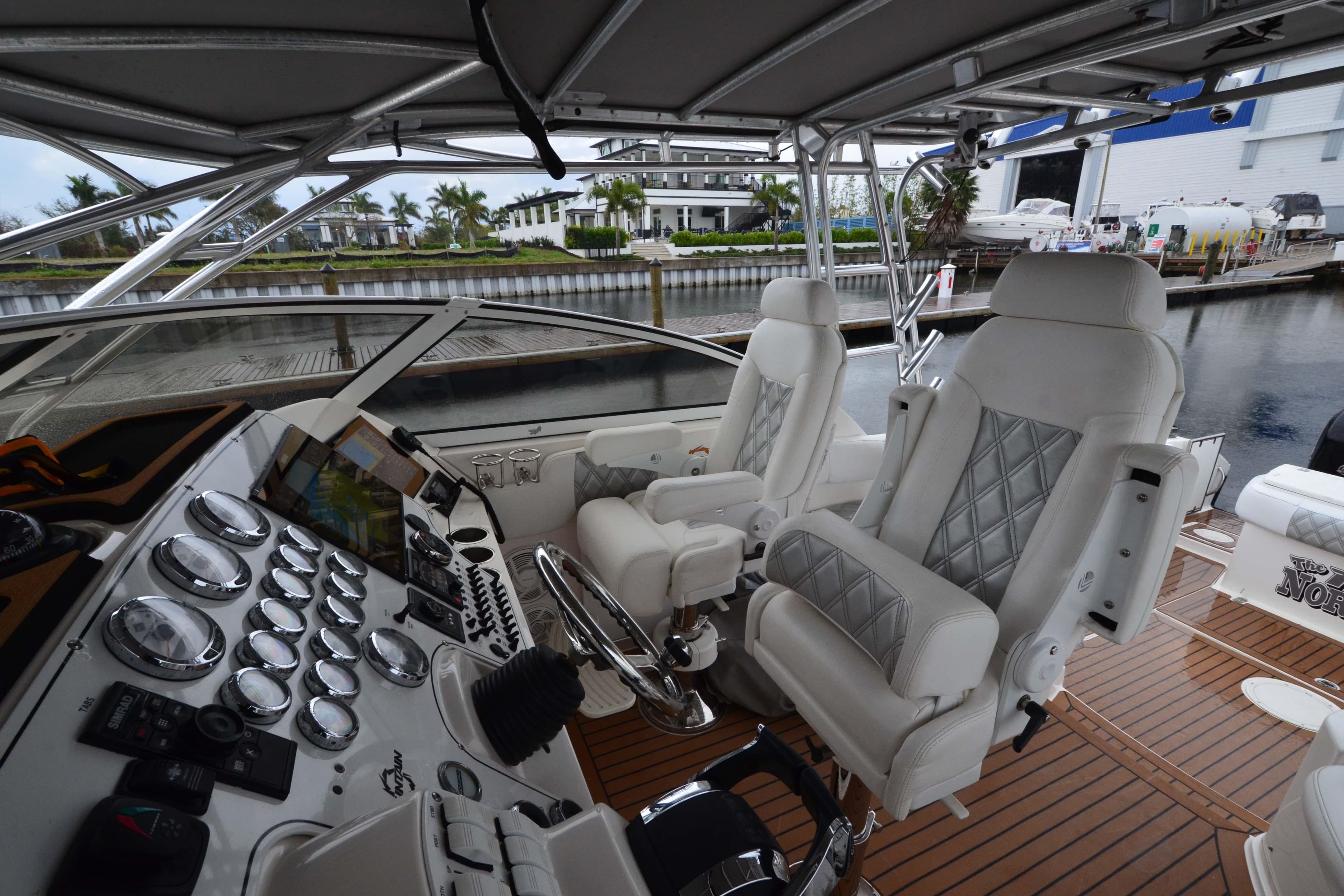 2007 Fountain 38 Sportfish Cruiser OB cockpit with luxurious seating and advanced controls.