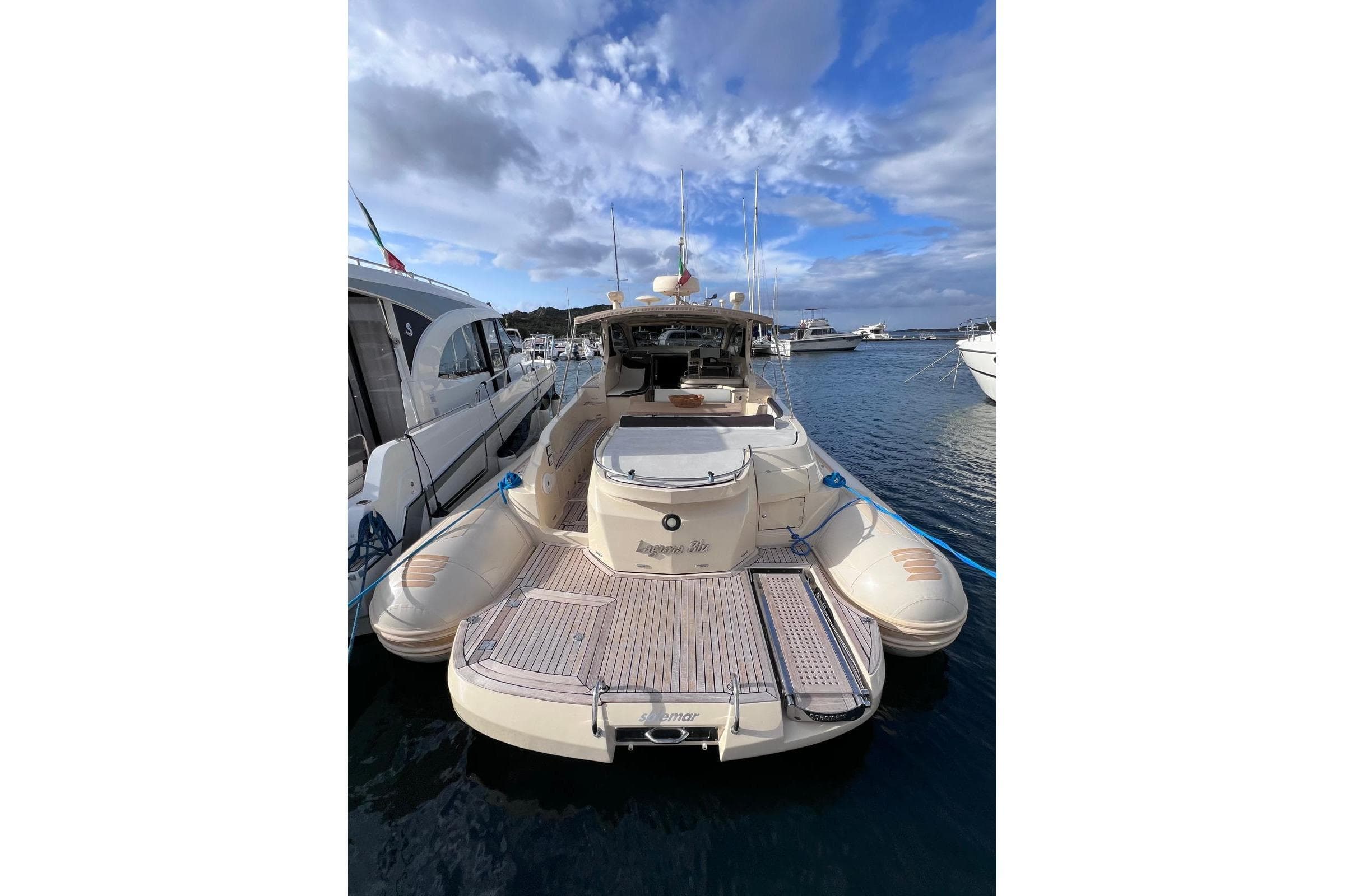 2014 Solemar 44.1 Oceanic yacht docked at marina under cloudy sky.