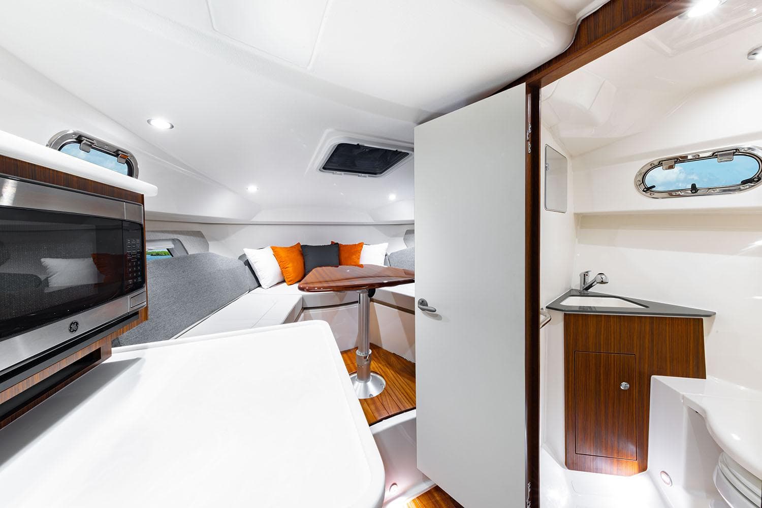 Manufacturer Provided Image: Interior of 2025 Pursuit OS 325 Offshore boat with modern amenities.