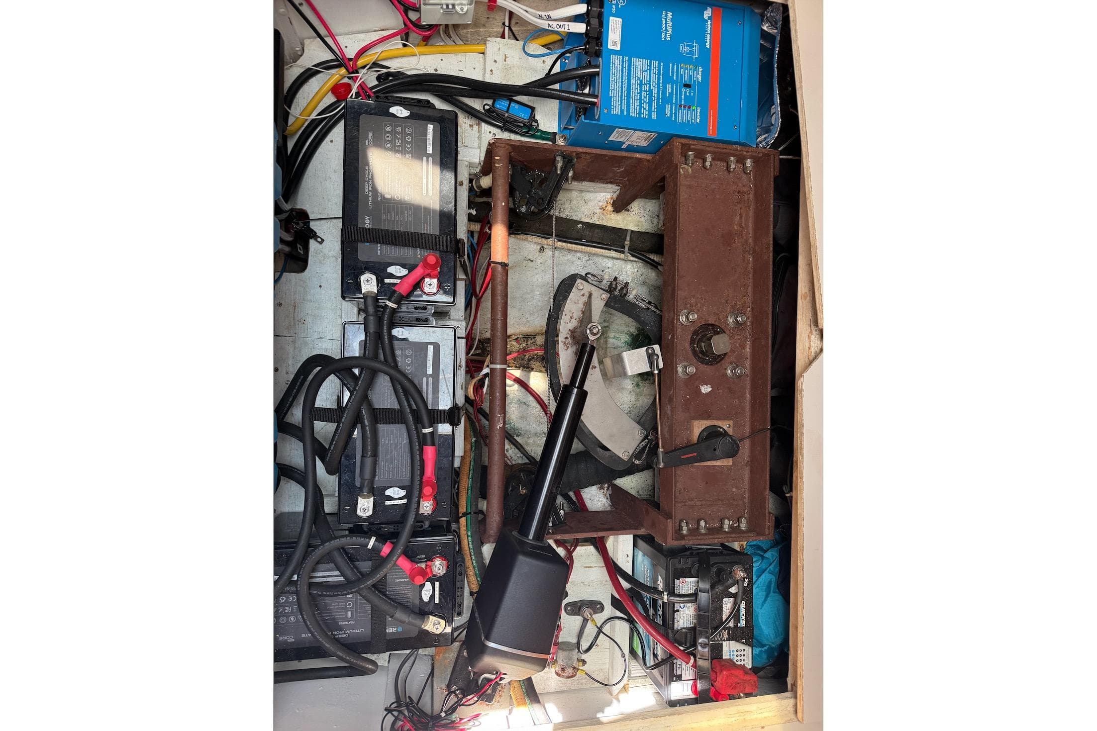 Electrical system of a 1991 Endeavour 42 boat with batteries and wiring.