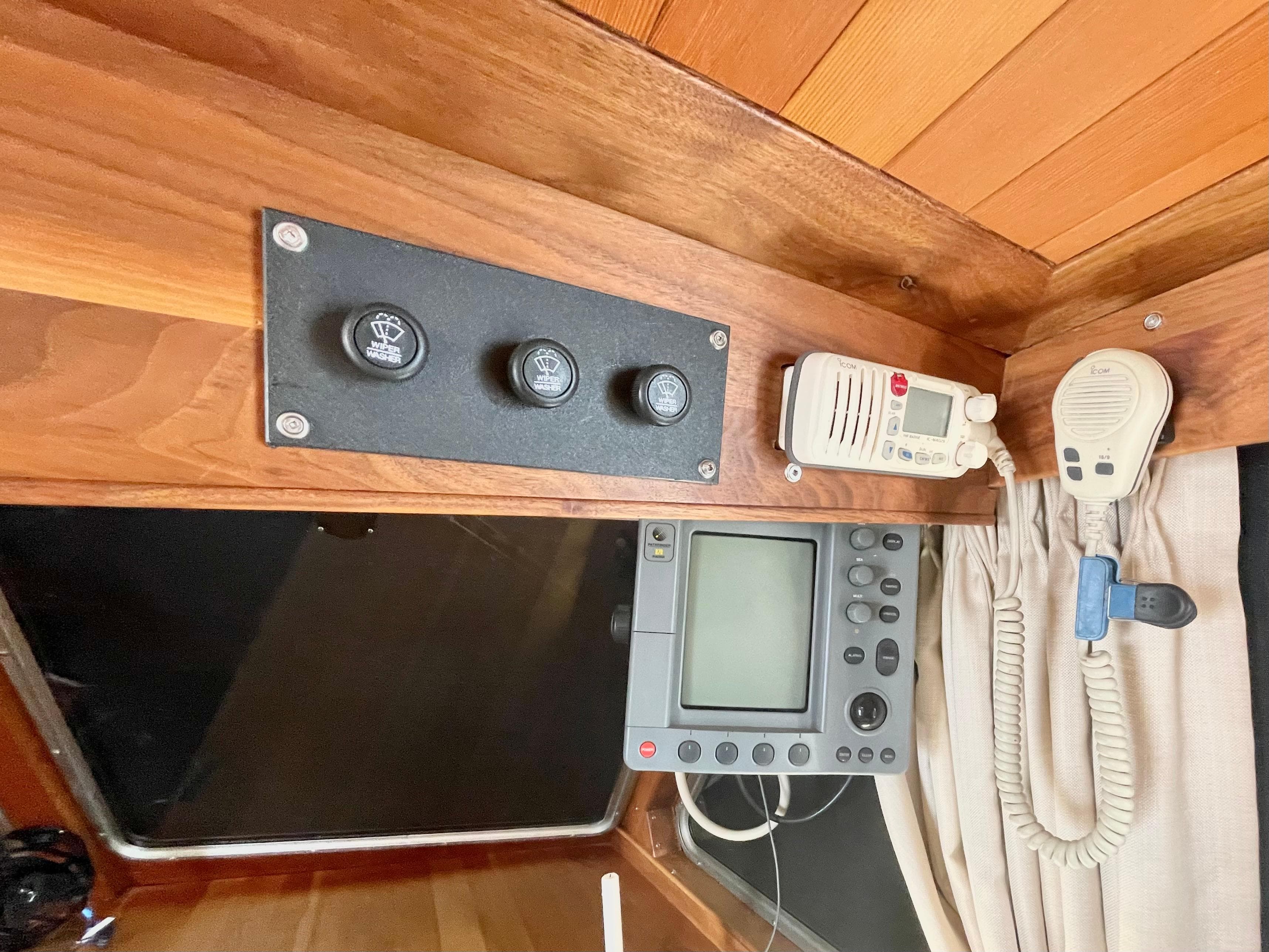 Control panel and radio equipment on a 1976 Tollycraft 48 Cockpit Motor Yacht.