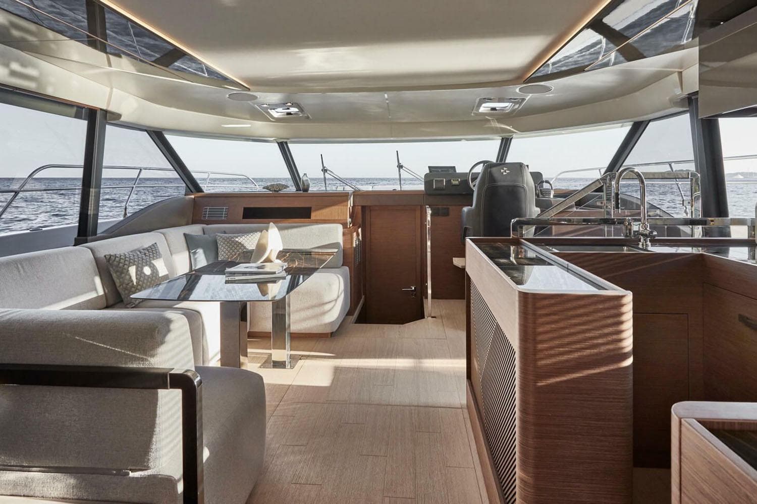 Manufacturer Provided Image: Luxurious interior of 2025 Prestige M48 yacht with modern seating and panoramic windows.