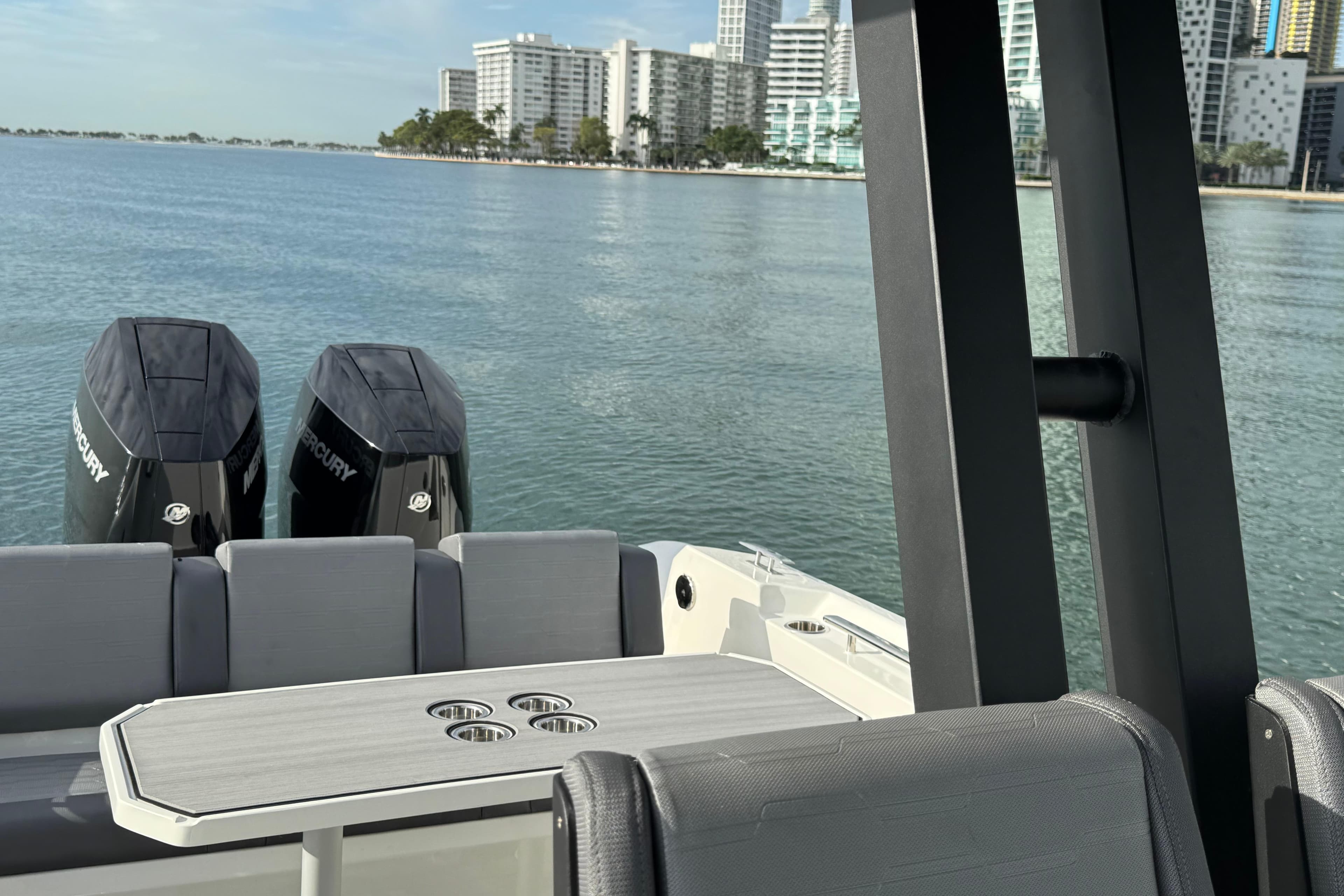 2026 Northstar ORION 10 boat with dual Mercury engines on a calm waterfront.