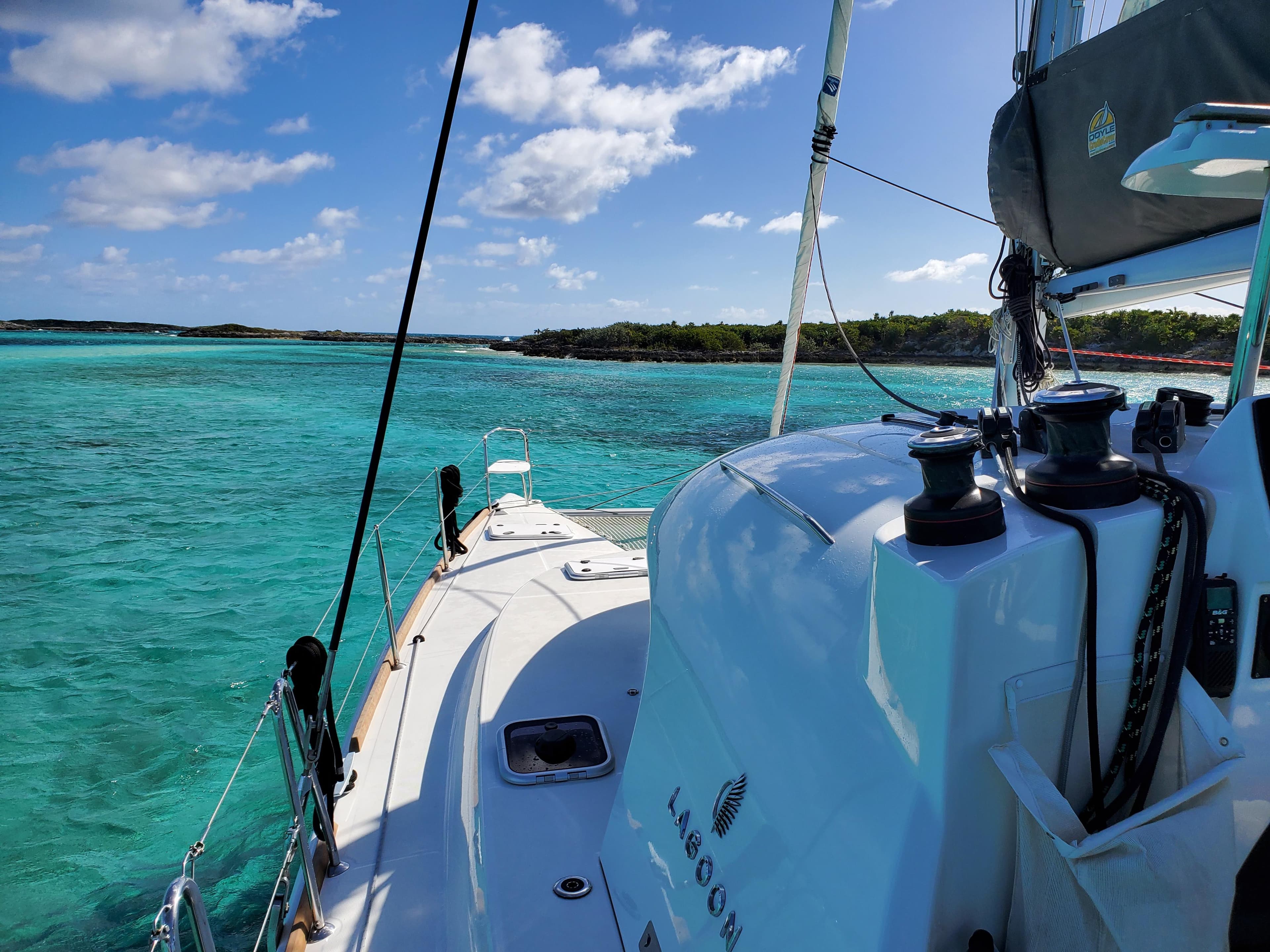 Lagoon 380 S2 sailing in clear turquoise waters, 2018 model.