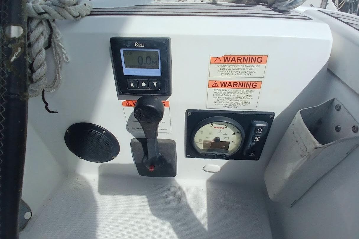 Control panel of a 2020 Beneteau Oceanis 46.1 sailboat with warning labels.