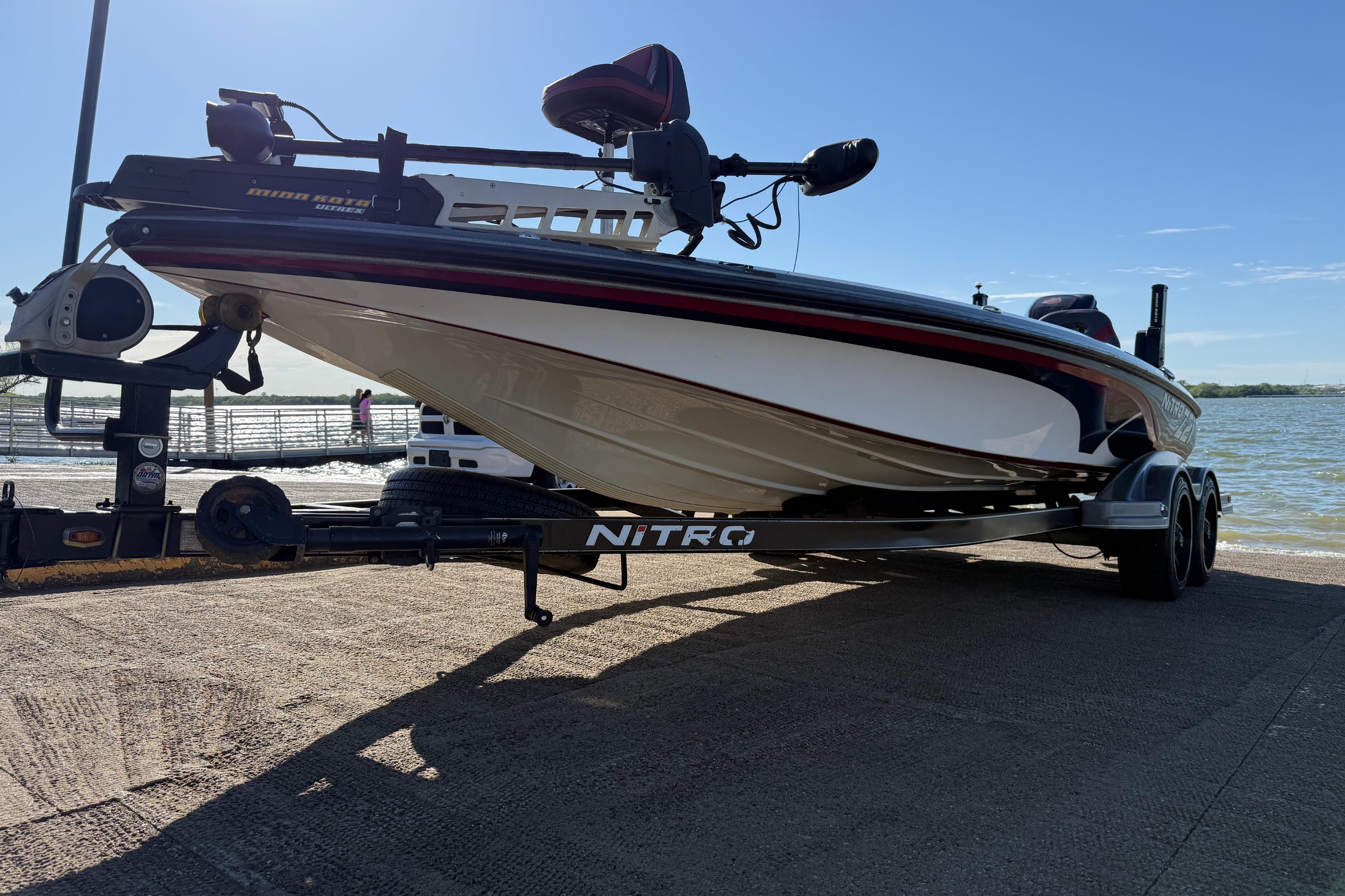 2016 Nitro Z21 boat on trailer by the water, ready for launch.