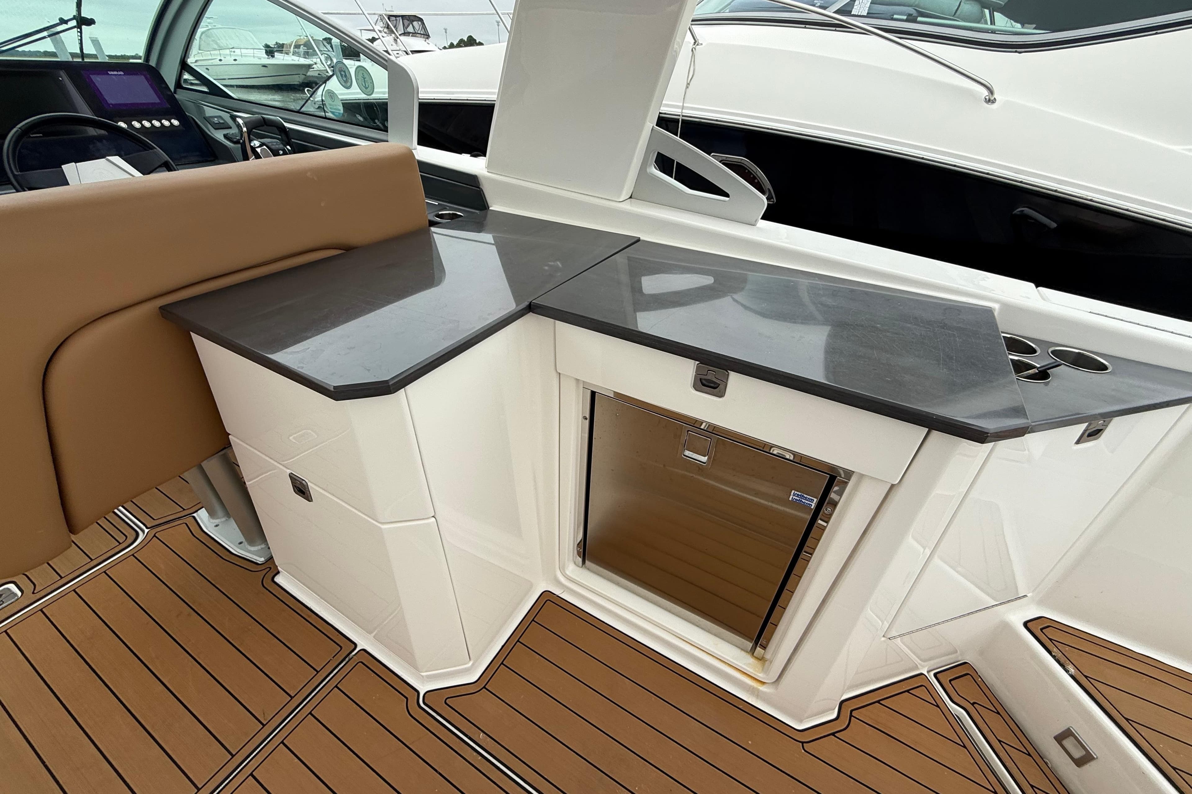 2022 Aviara AV32 OB boat interior with sleek countertop and modern design.
