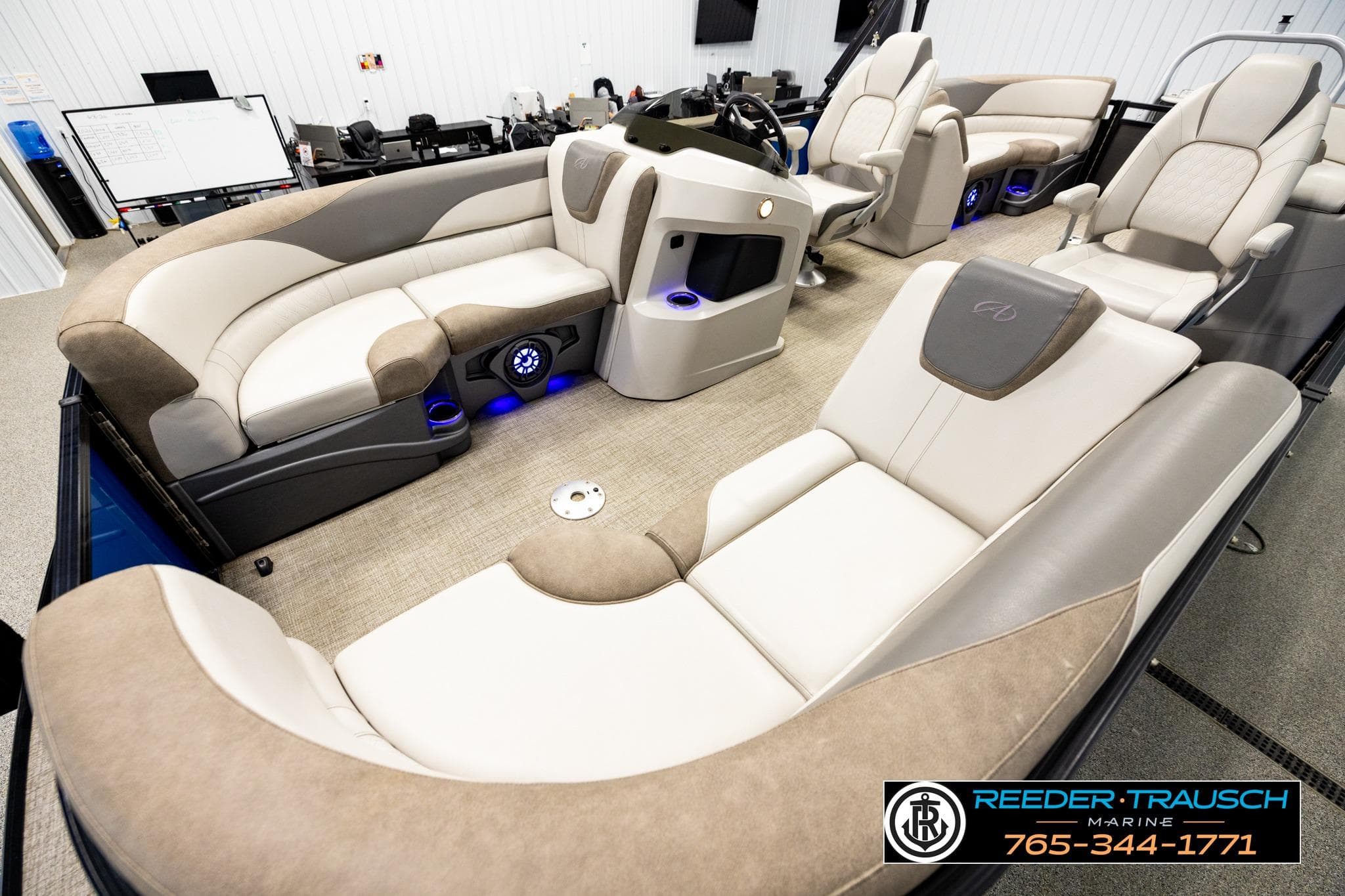Luxurious 2021 Avalon LSZ QL pontoon boat interior with plush seating and modern design.