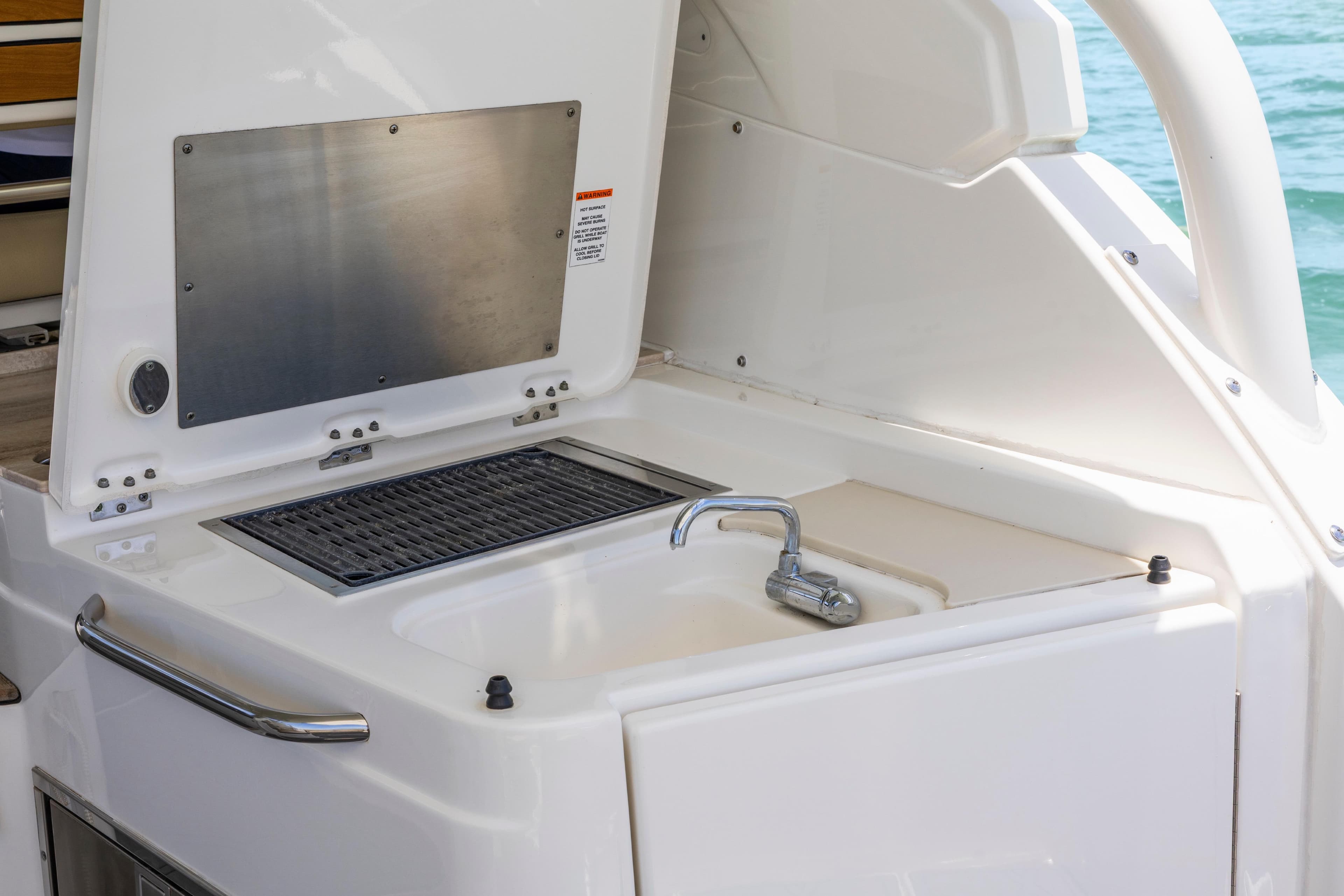 2021 Pursuit DC 365 Dual Console boat sink and grill setup.