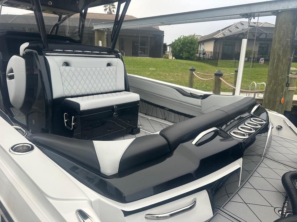 2024 Nor-Tech 340 Sport Center Console boat with luxurious seating and sleek design.