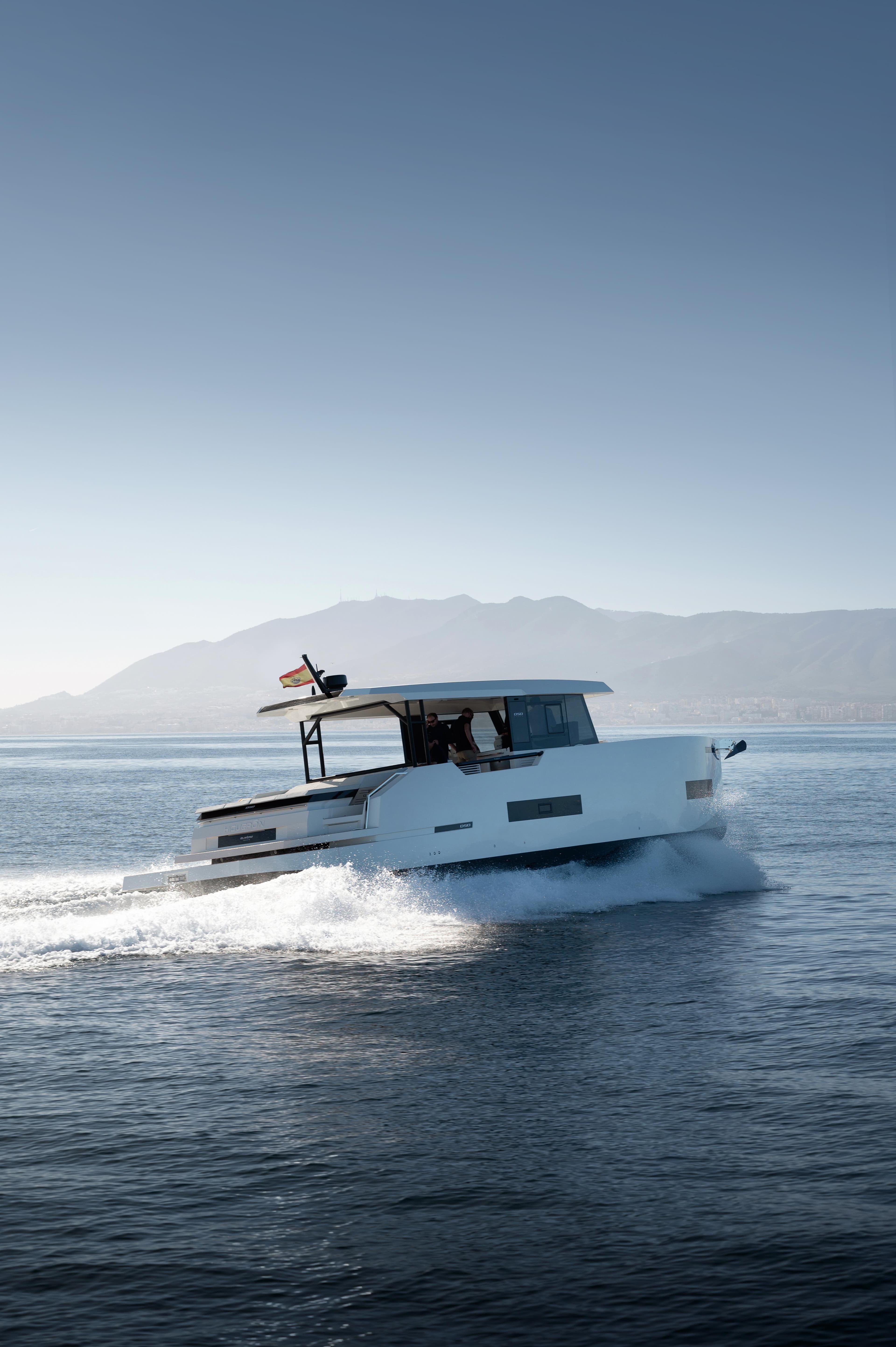 2025 De Antonio Yachts D50 Coupé cruising on open water.