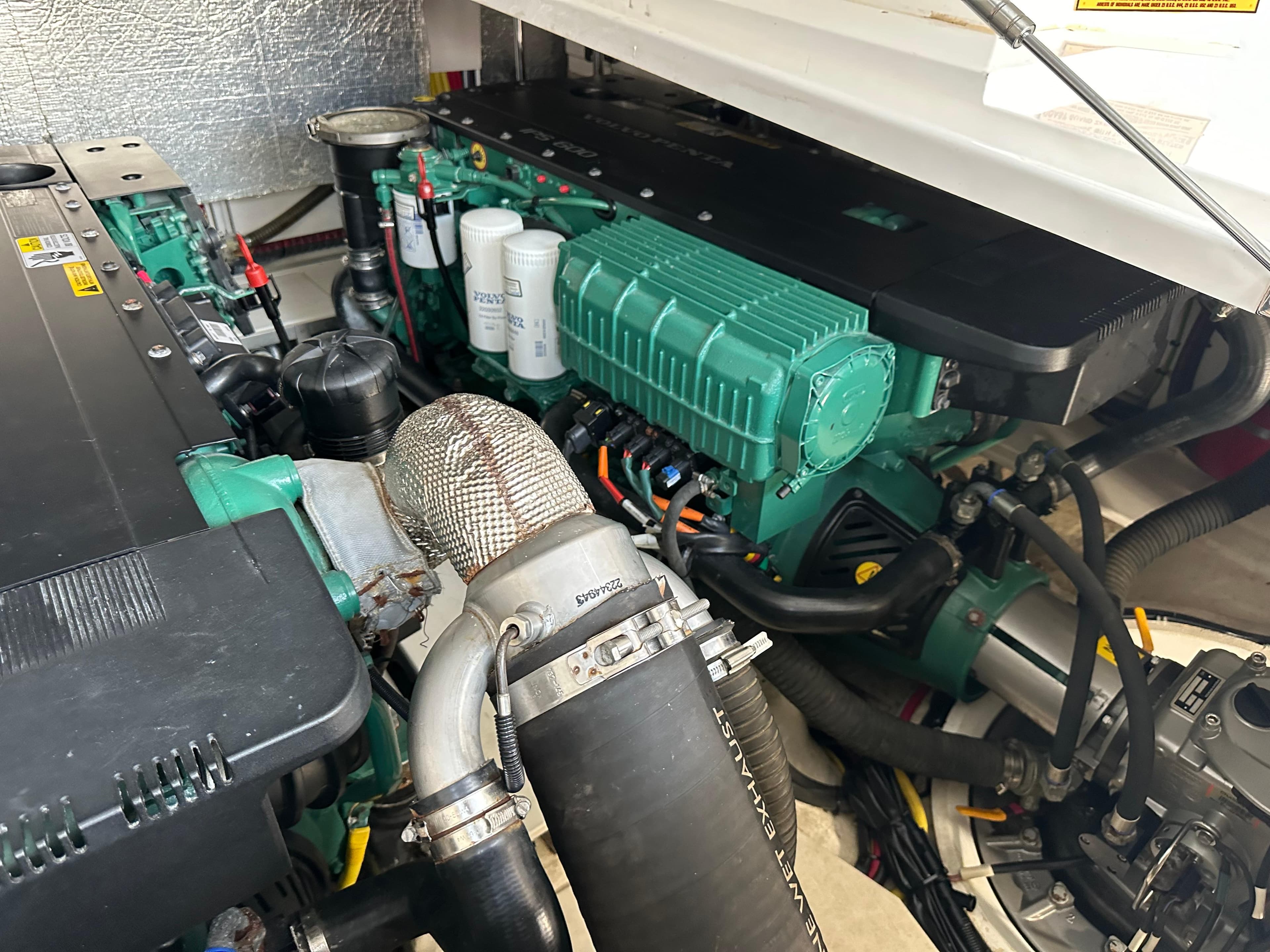 Engine compartment of a 2018 Galeon 485 HTS yacht, showcasing mechanical components and systems.