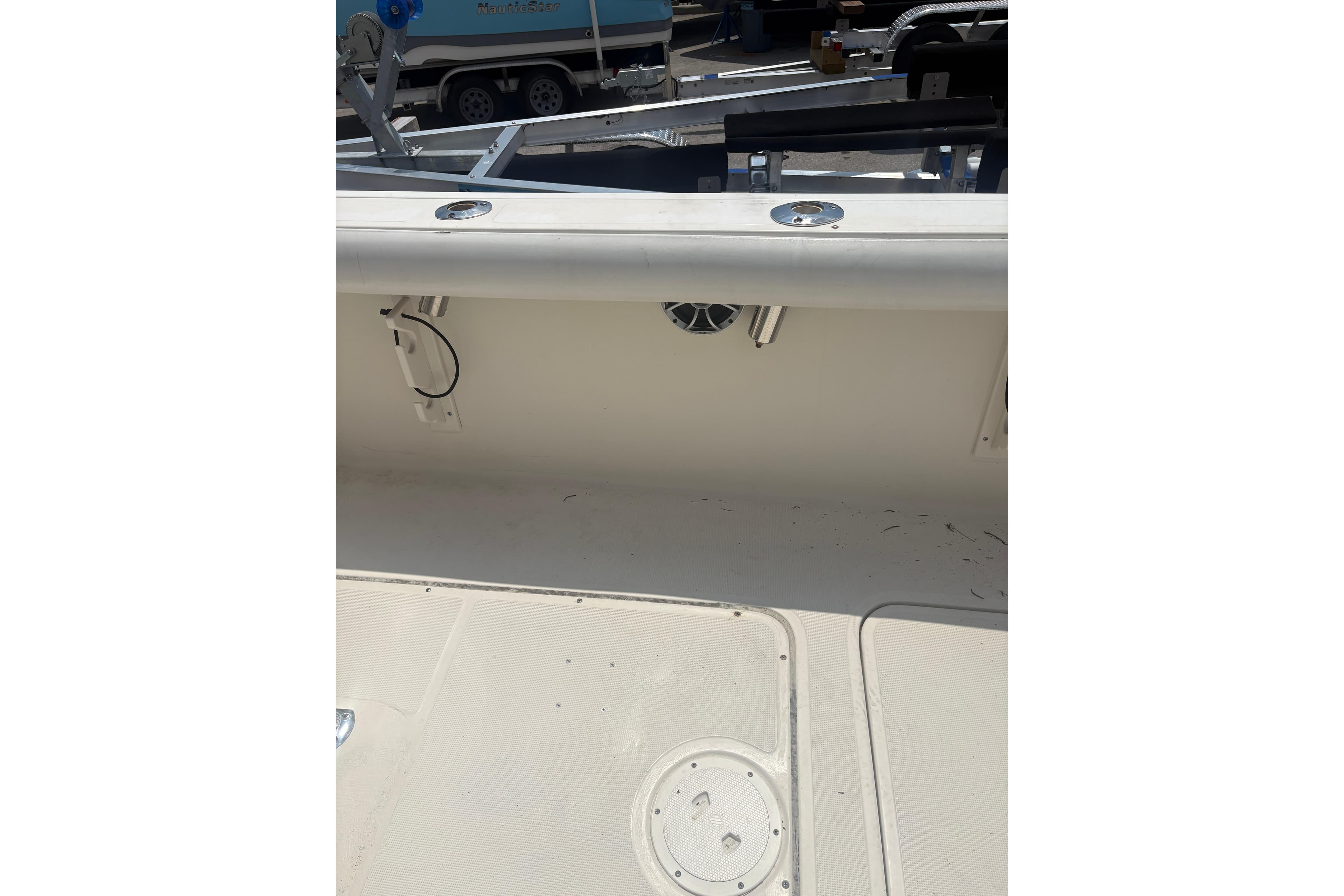 1998 Pursuit 2870 Center Console boat interior with speaker and clean deck.