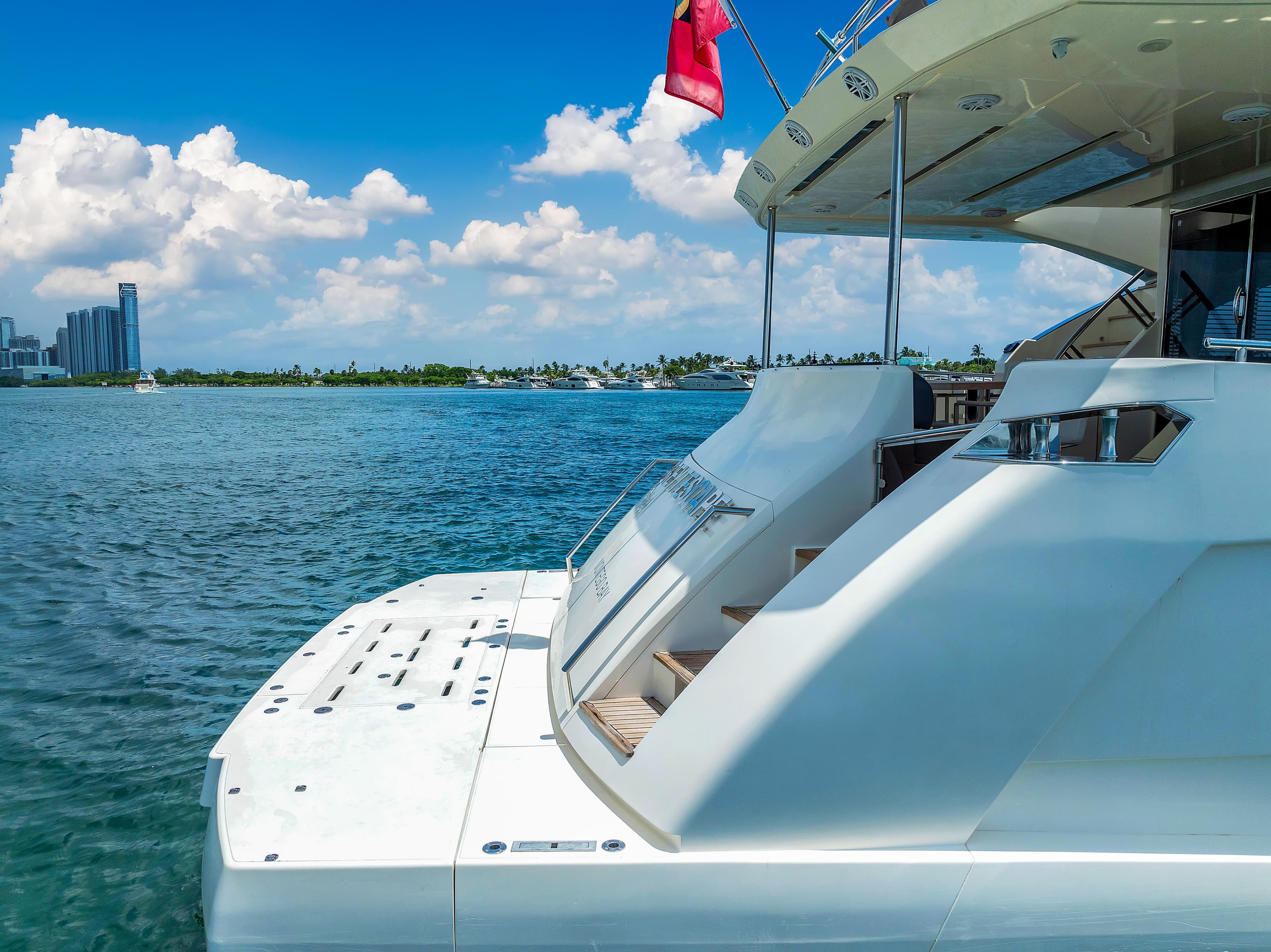 Astondoa 72 GLX yacht, 2013 model, docked on a sunny day with ocean view.