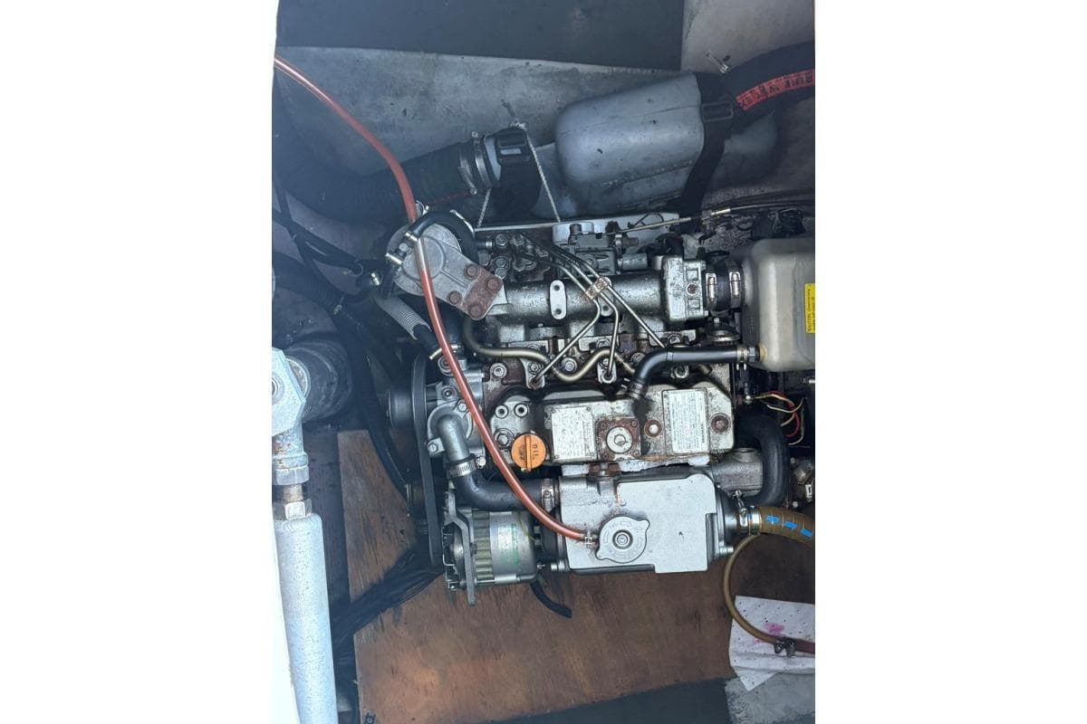 Engine of a 2008 Lagoon 420 catamaran, showcasing intricate mechanical components.