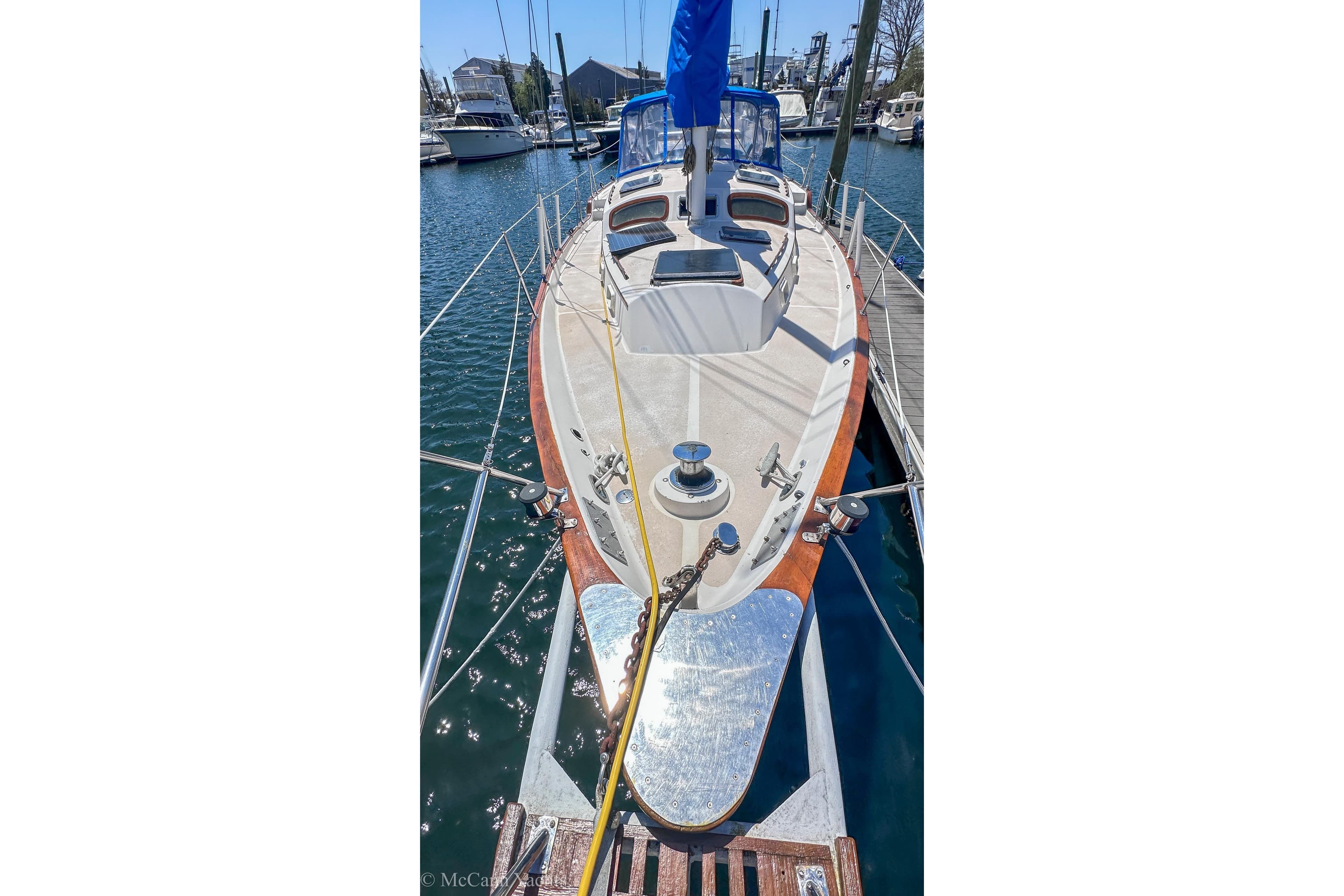 1980 Irwin 46 sailboat docked in a marina, showcasing its deck and rigging.