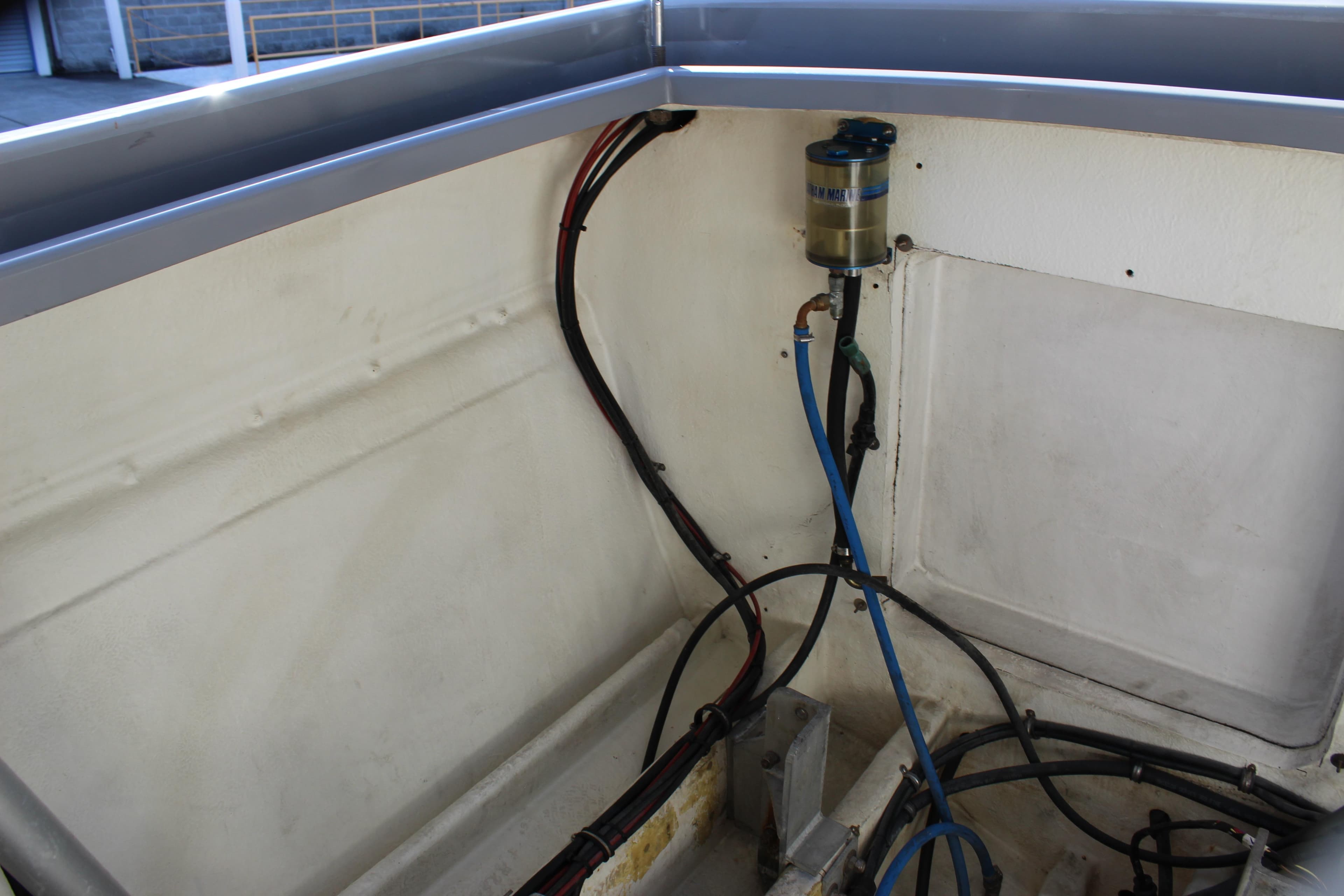 Engine compartment of 2007 Chaudron 41 SS boat with visible wiring and components.