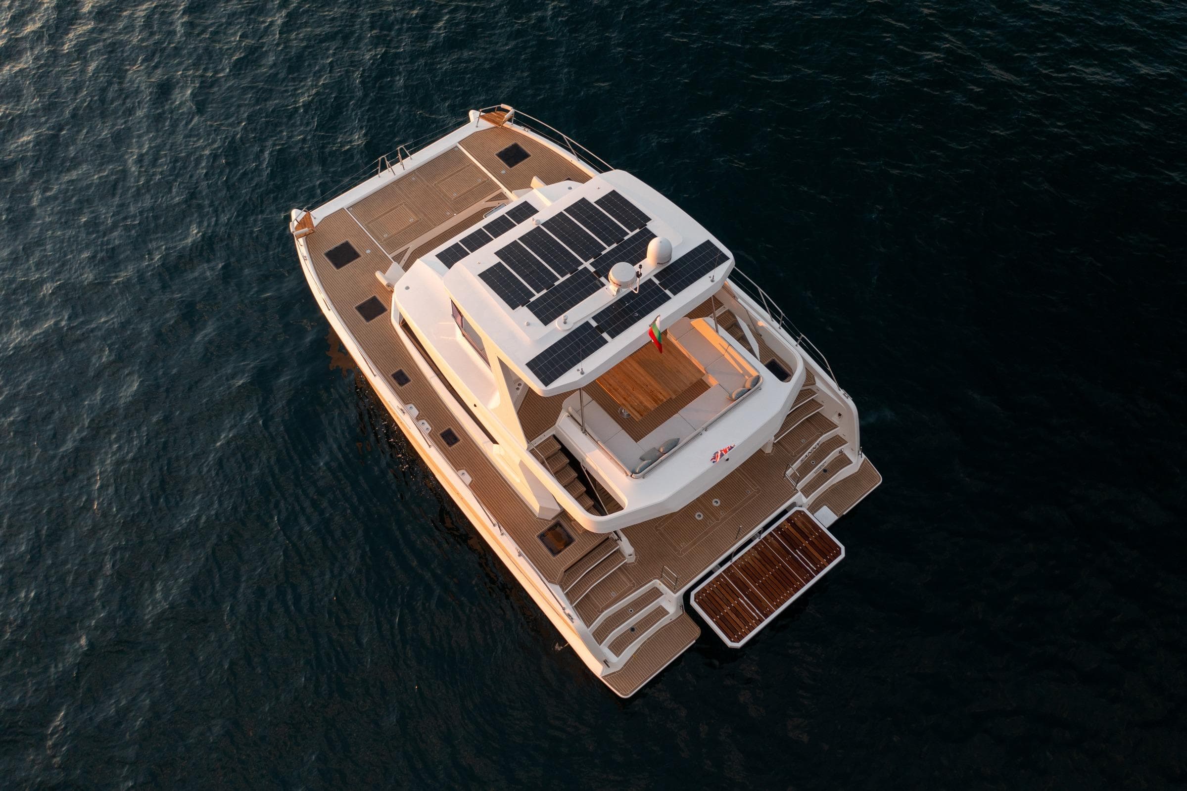 Aerial view of 2025 Omaya 50 Power Catamaran with solar panels on deck.