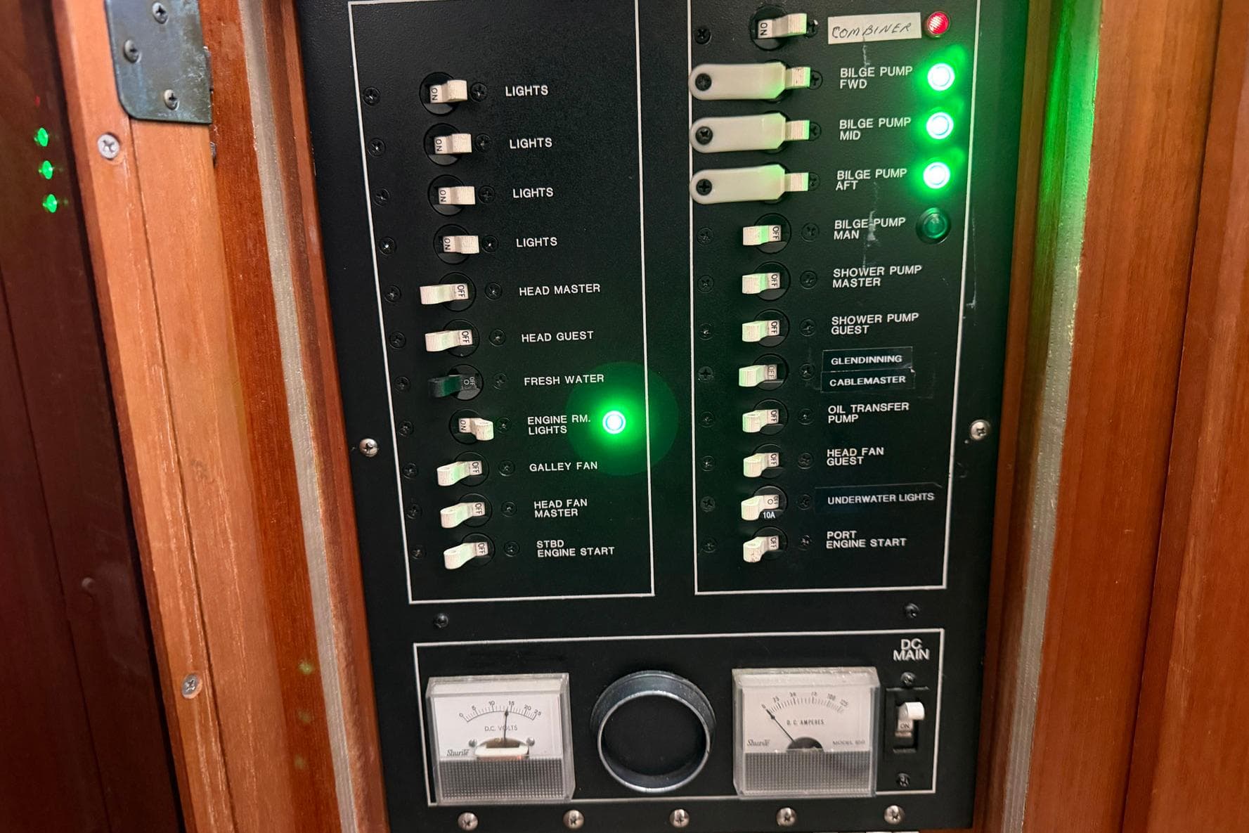 Control panel of a 1987 Viking 44 Motor Yacht with switches and indicators.