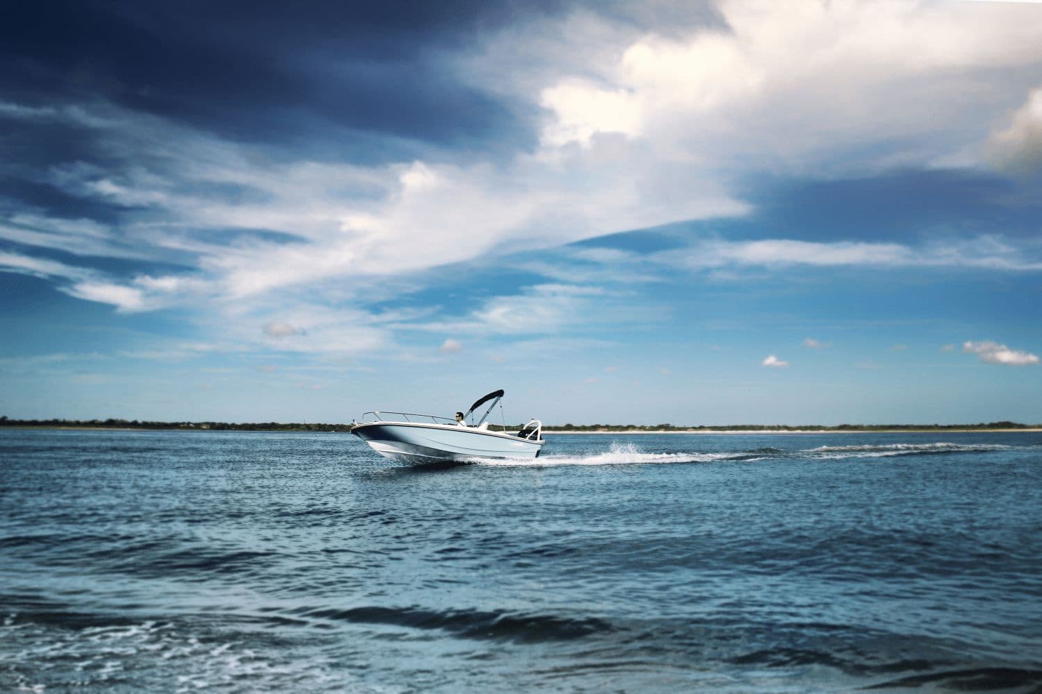 Boston Whaler 160 Super Sport 2026 on open water under blue sky.