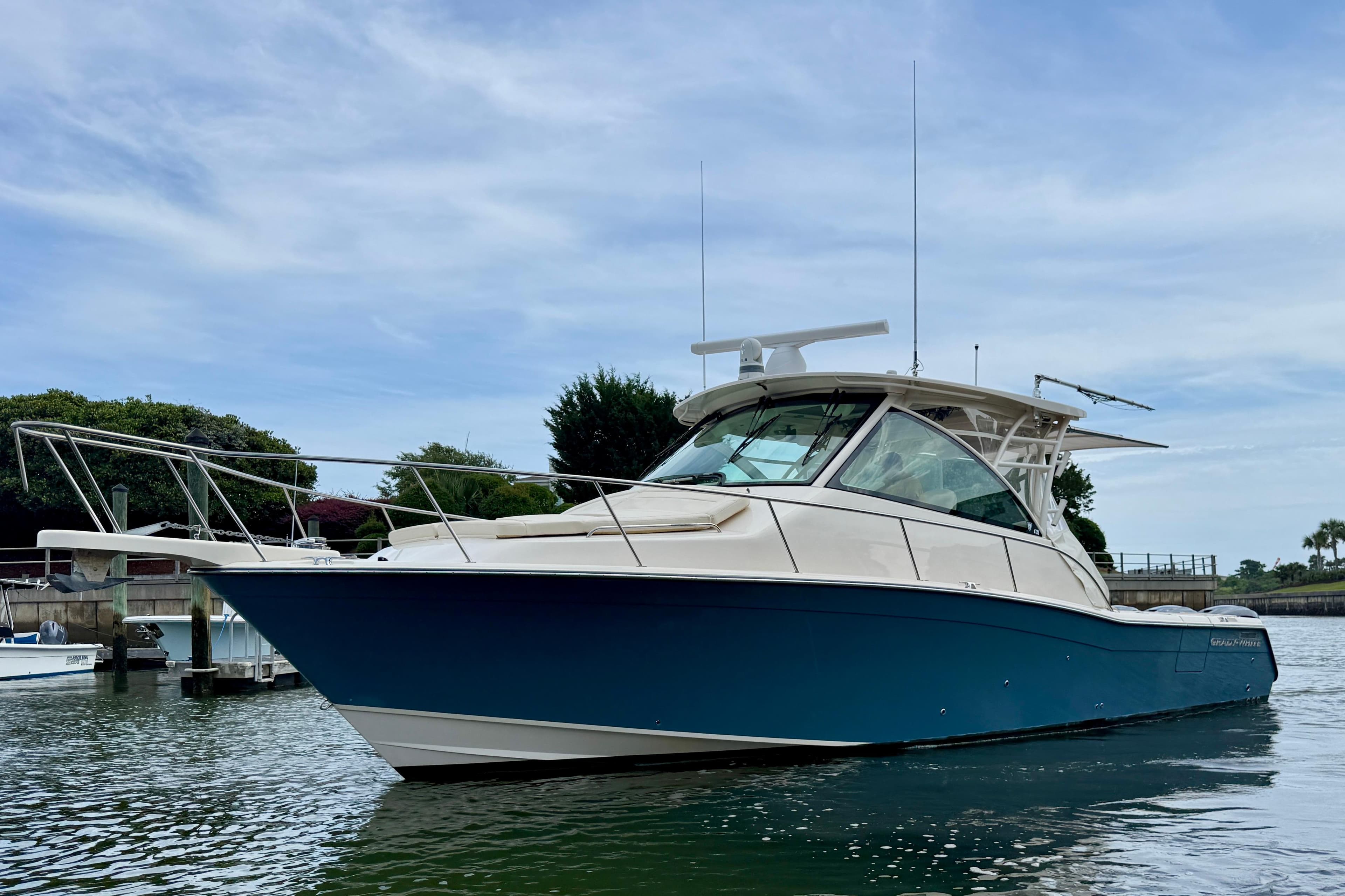 2021 Grady-White Express 370 boat on water, featuring sleek design and modern amenities.
