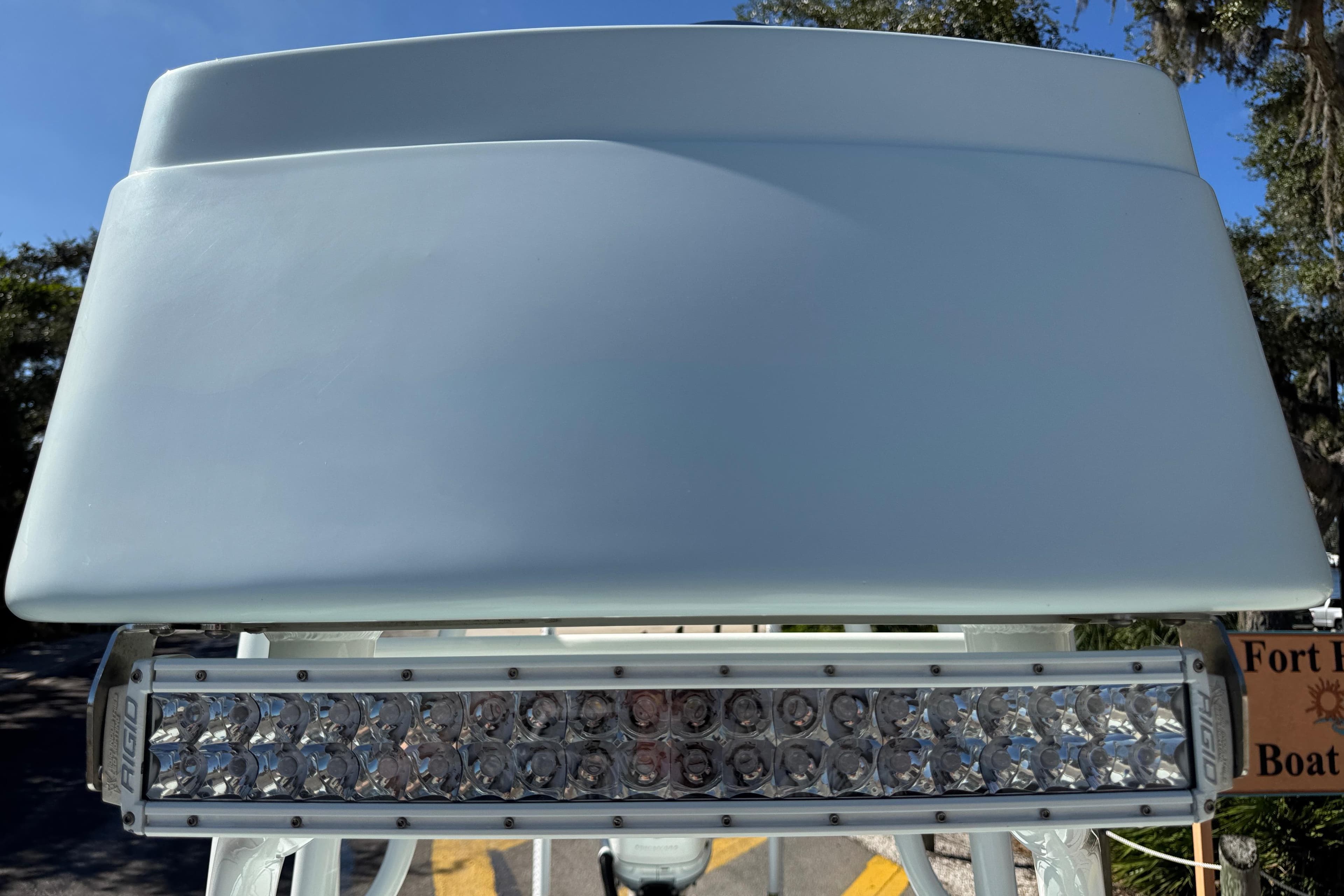 2017 Yellowfin 24 Bay CE boat with LED light bar, outdoor setting.