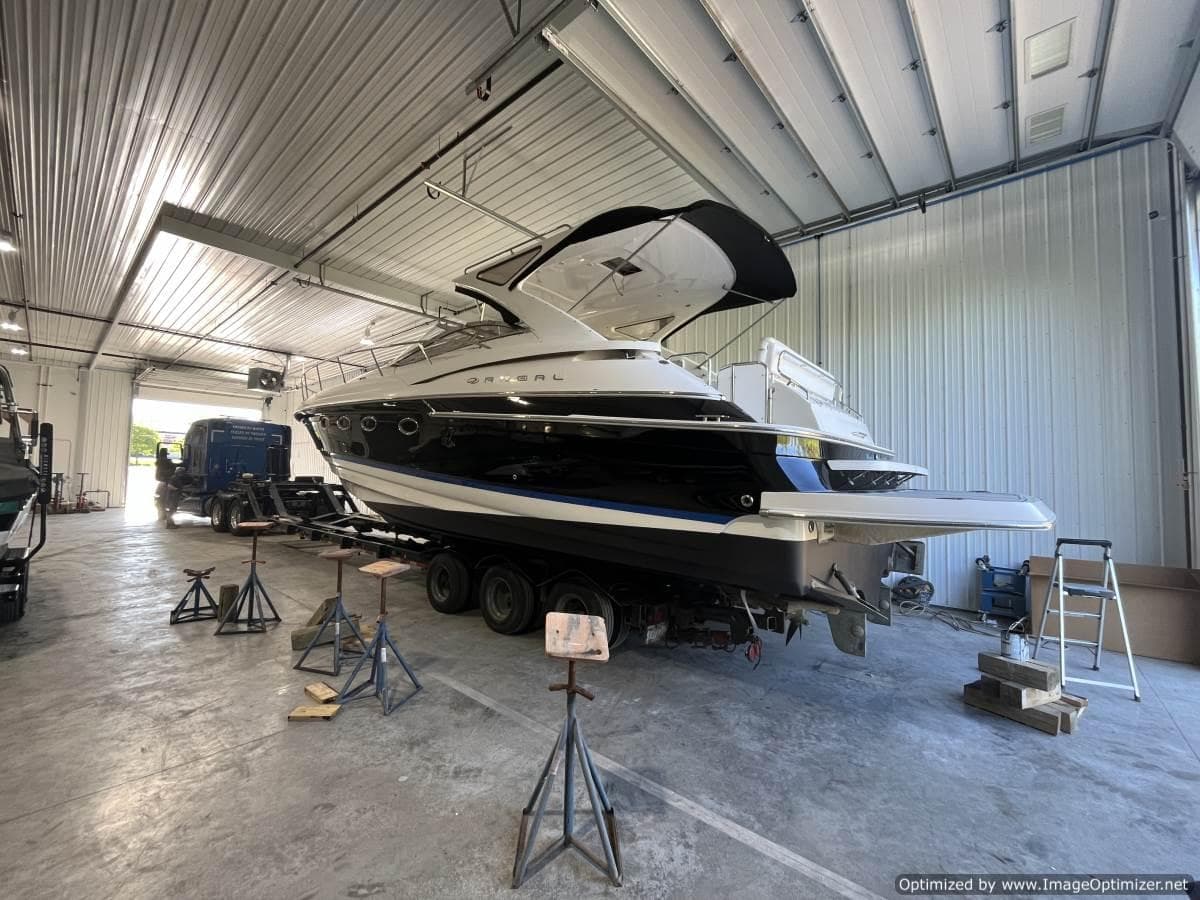 2008 Regal Commodore 4460 yacht in a spacious indoor storage facility.