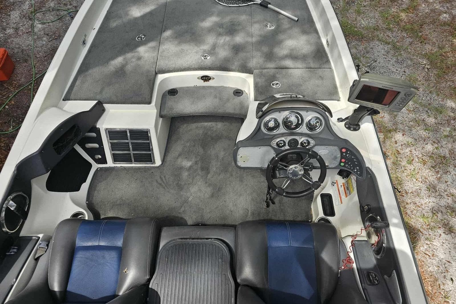 2008 Ranger Z520 Comanche boat interior with steering wheel and control panel.