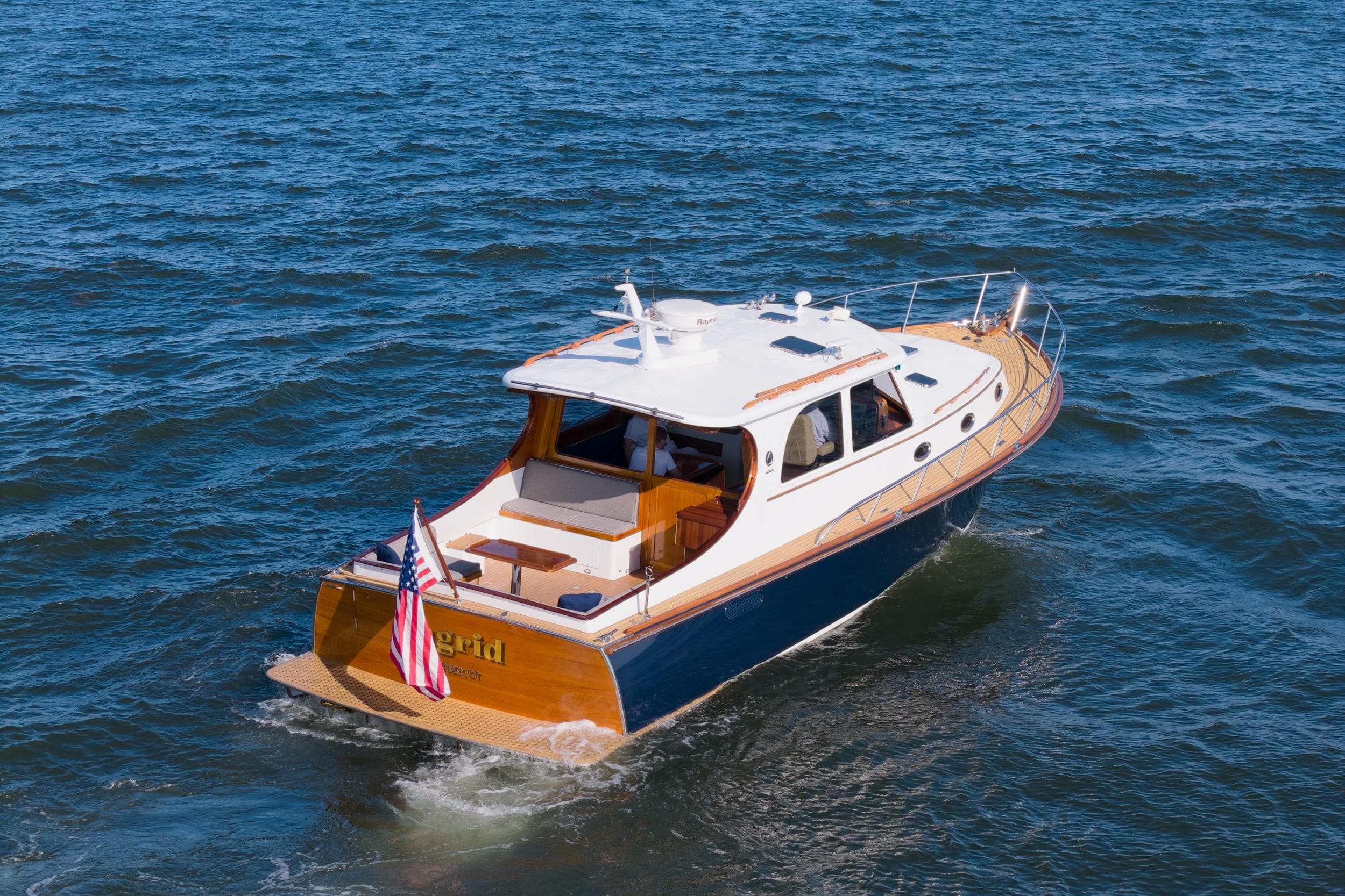2007 Gorbon Custom Downeast 40 yacht cruising on open water.