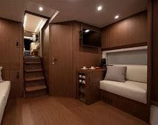 Luxurious interior of 2024 Solaris Power 48' Lobster yacht with modern wood finish.