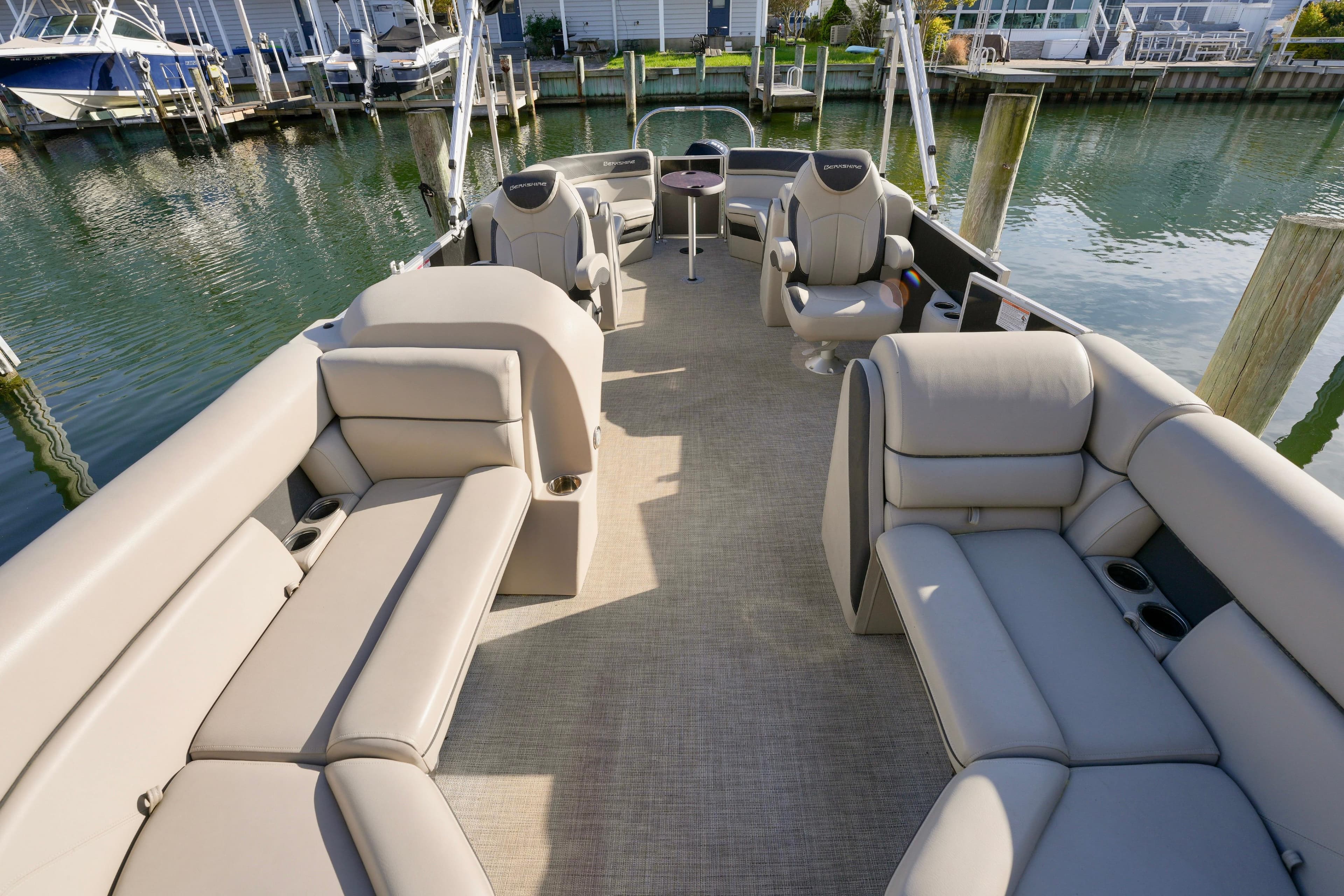 2023 Berkshire 24 RFX LE 2.75 pontoon boat with spacious seating and modern design.