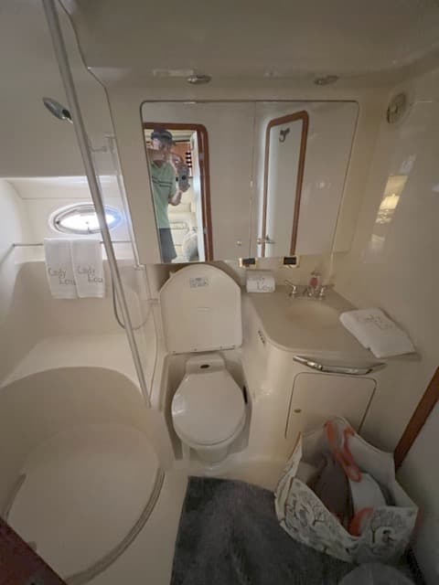 Bathroom interior of a 2000 Sea Ray 460 Sundancer yacht.