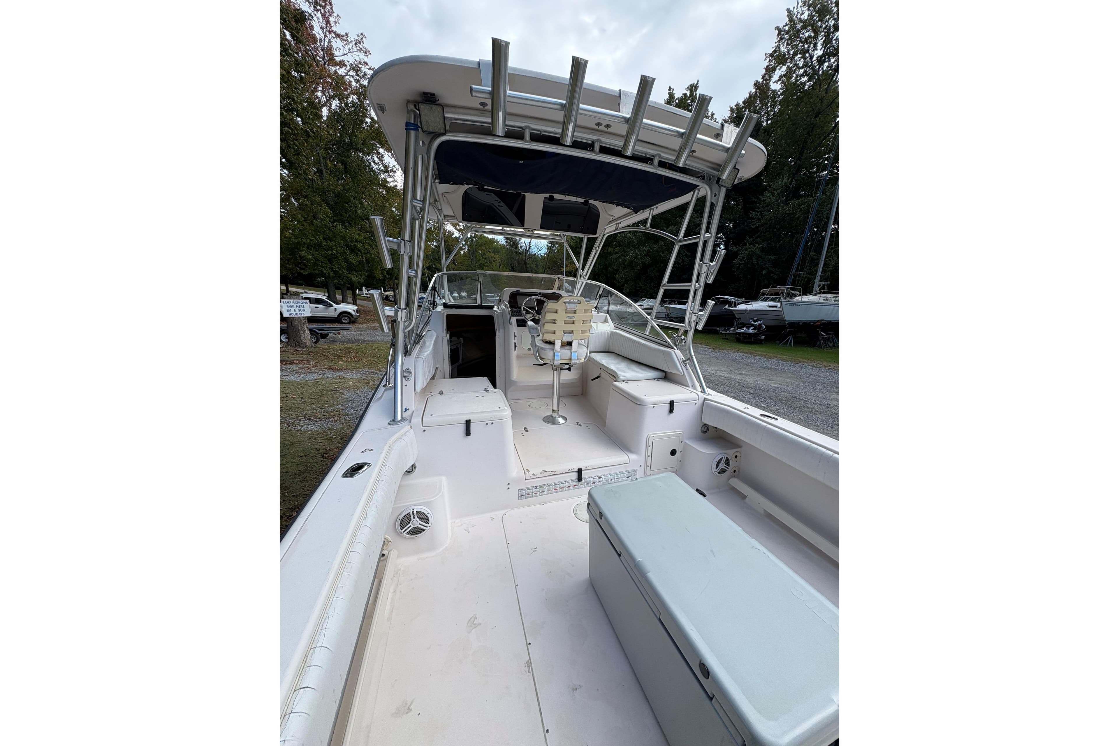 2001 Grady-White Express 265 boat interior with seating and storage, docked outdoors.