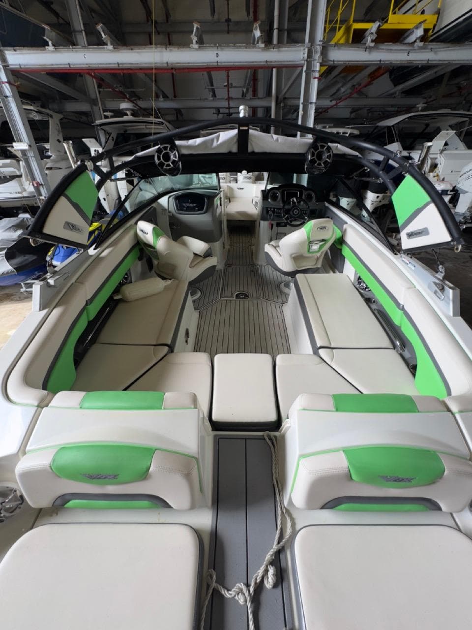 2018 Chaparral Vortex 2430 boat interior with green and white seating.