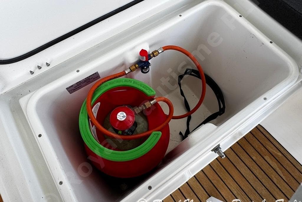 Gas cylinder in storage compartment of 2018 Lagoon 42 catamaran.