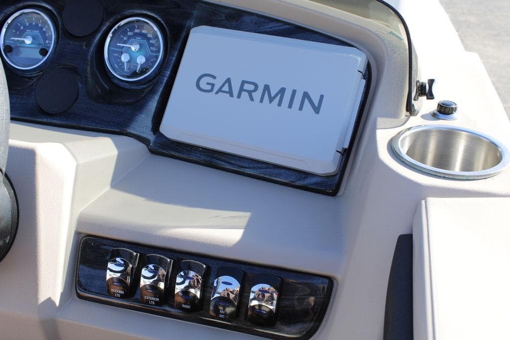 Dashboard of 2026 Avalon LSZ Cruise boat with Garmin navigation system.