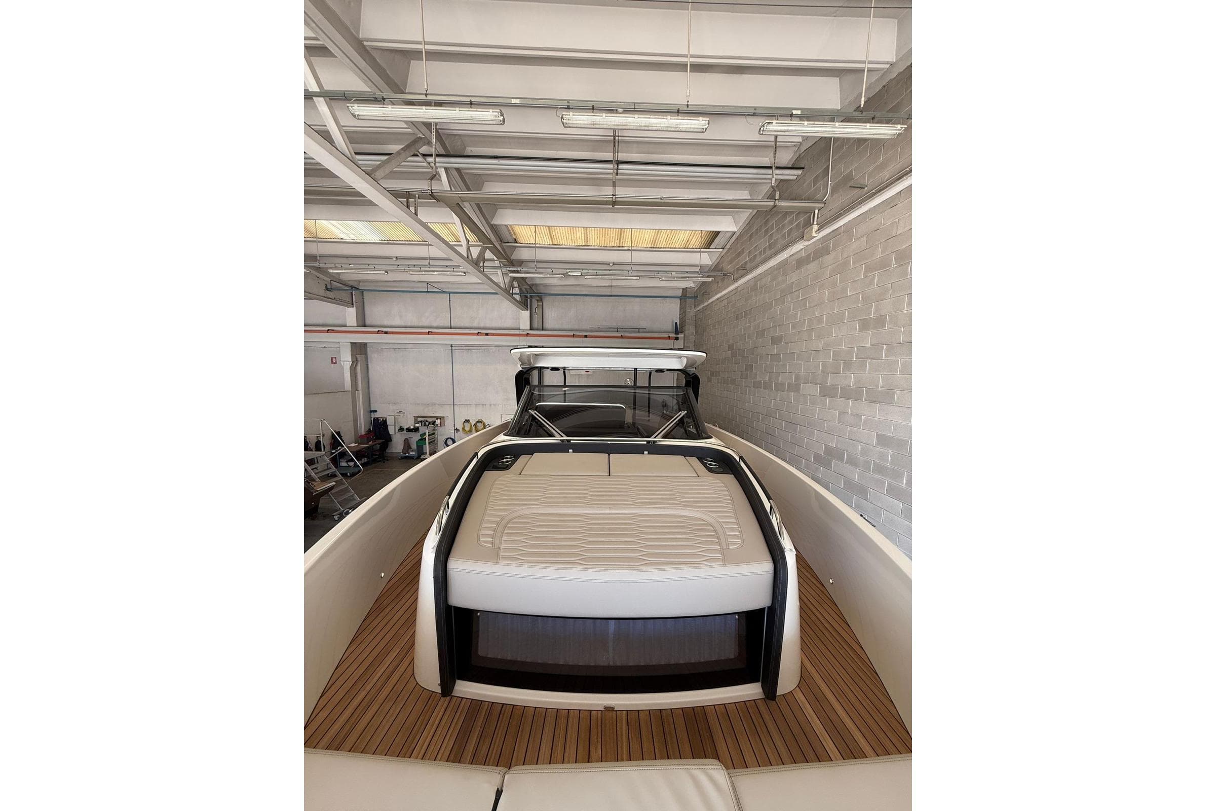 2026 Cranchi A46 Luxury Tender in a modern indoor storage facility.