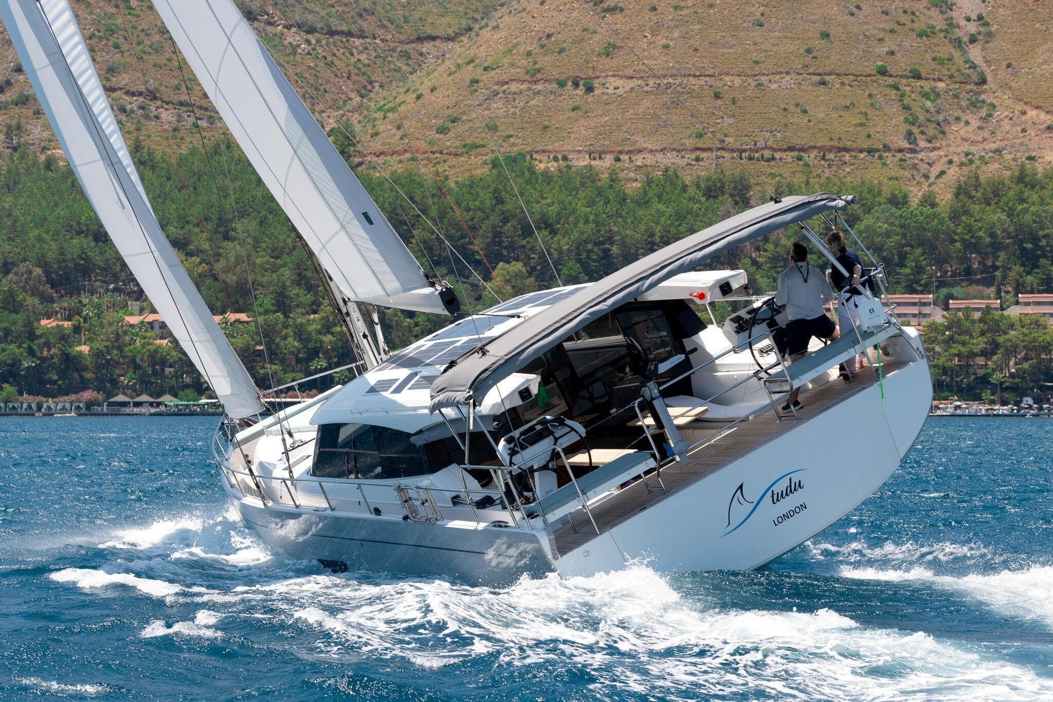 Sailing yacht Moody Decksaloon 48, 2026 model, navigating vibrant blue waters.