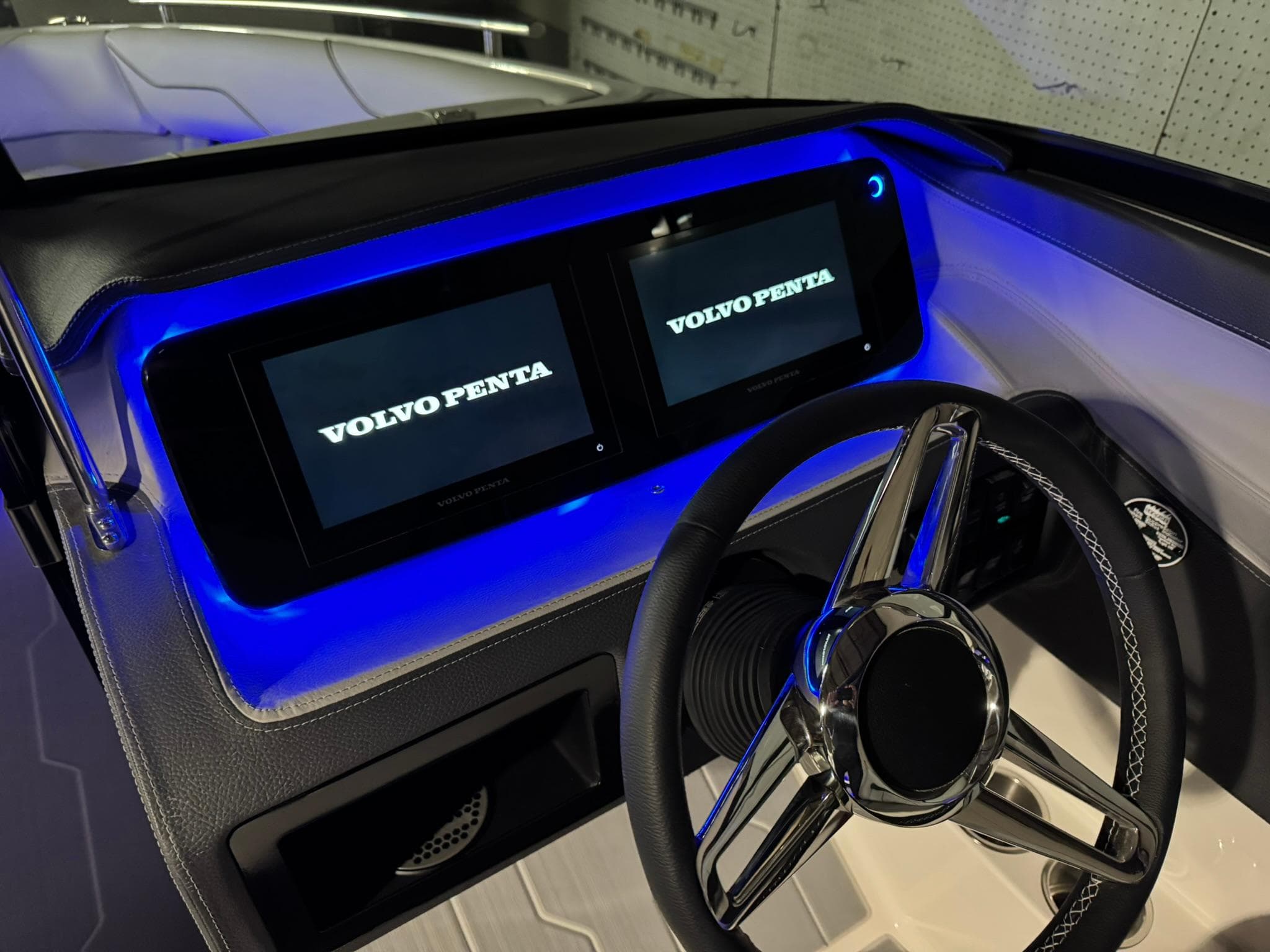 2025 Regal LS4 Surf dashboard with dual Volvo Penta displays and illuminated controls.