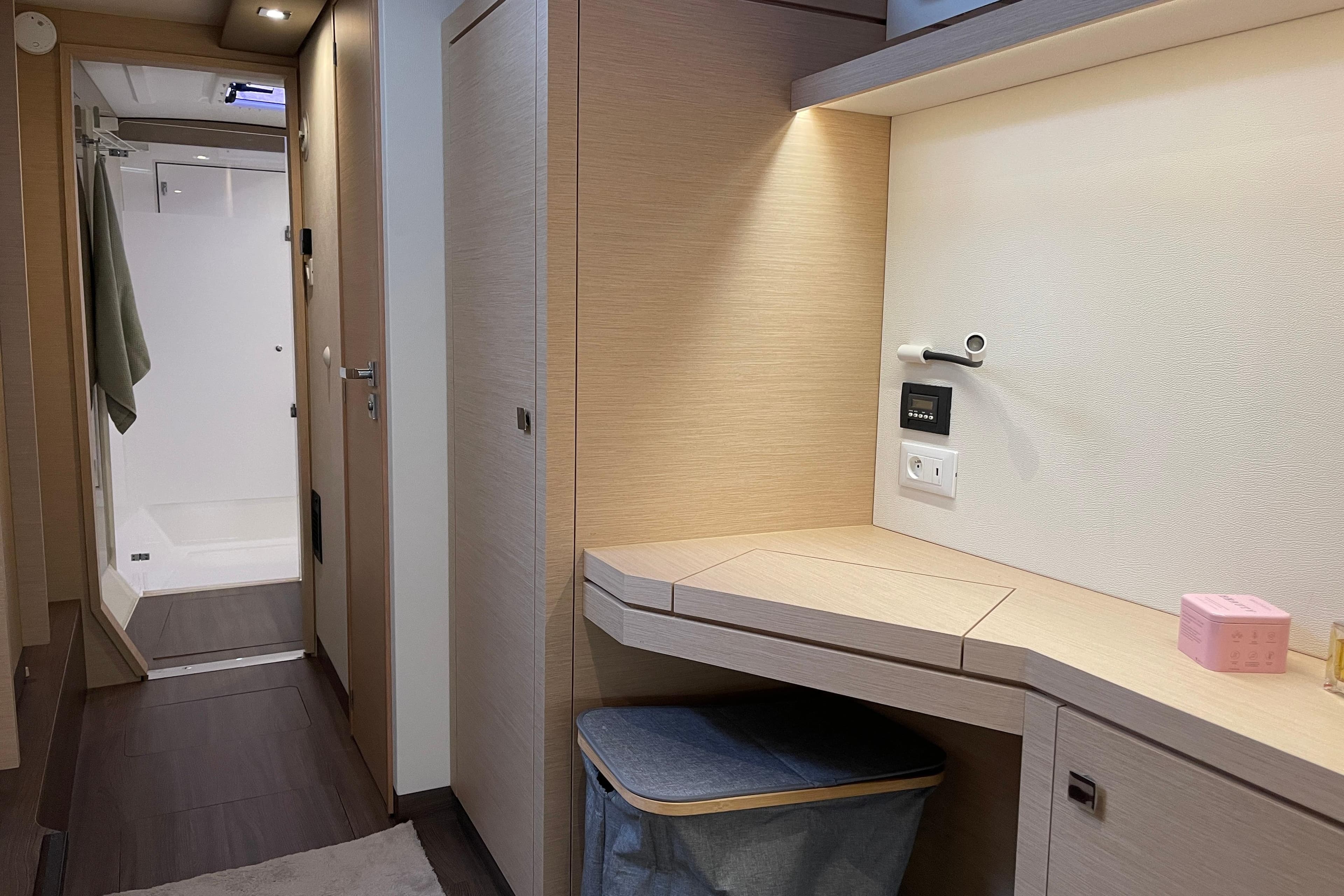 2018 Fountaine Pajot Lucia 40 interior with modern bathroom and sleek wooden cabinetry.