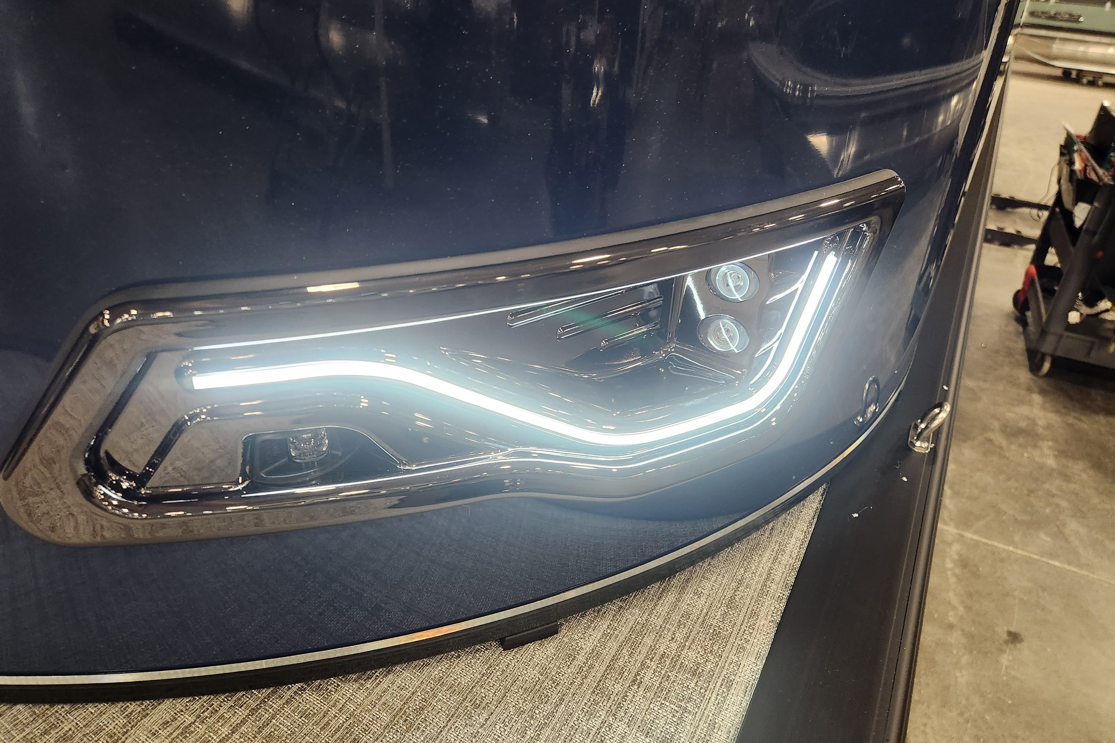 2026 Tahoe Pontoon 23 LTZ Rear Bench with sleek LED headlight design.