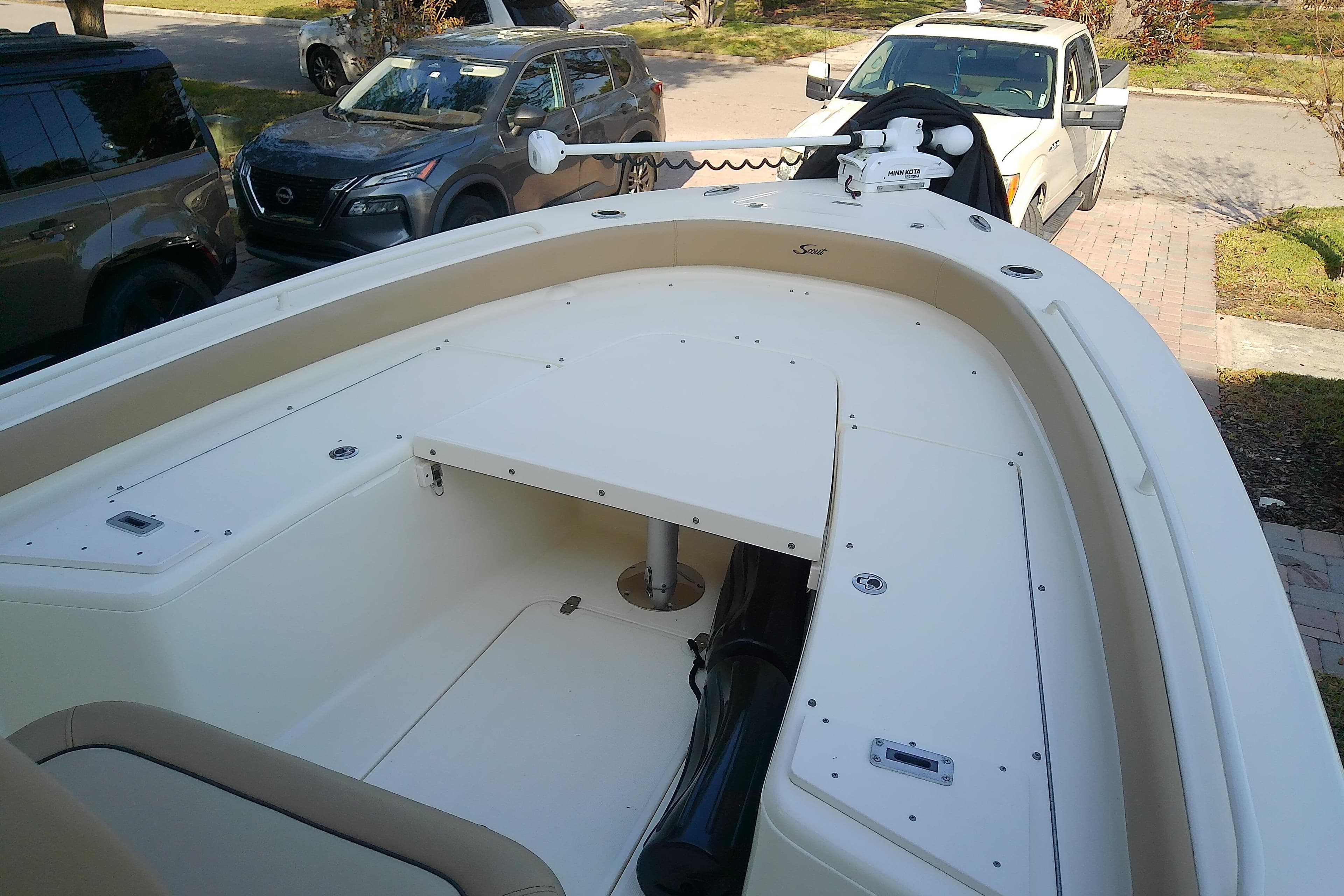 2018 Scout 251 XSS boat interior with seating and storage compartments.