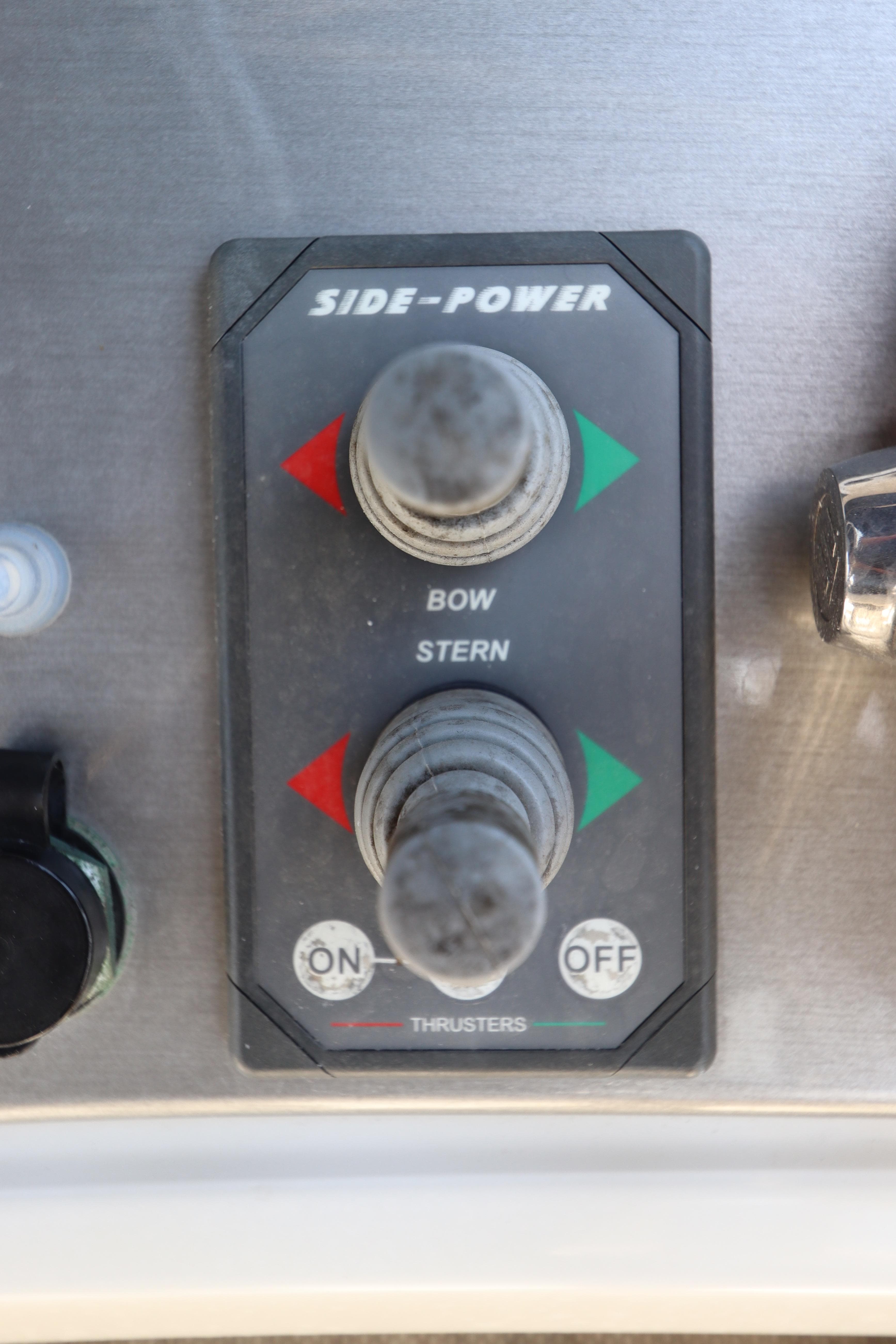 Control panel for bow and stern thrusters on a 2007 Carver 35 Super Sport.