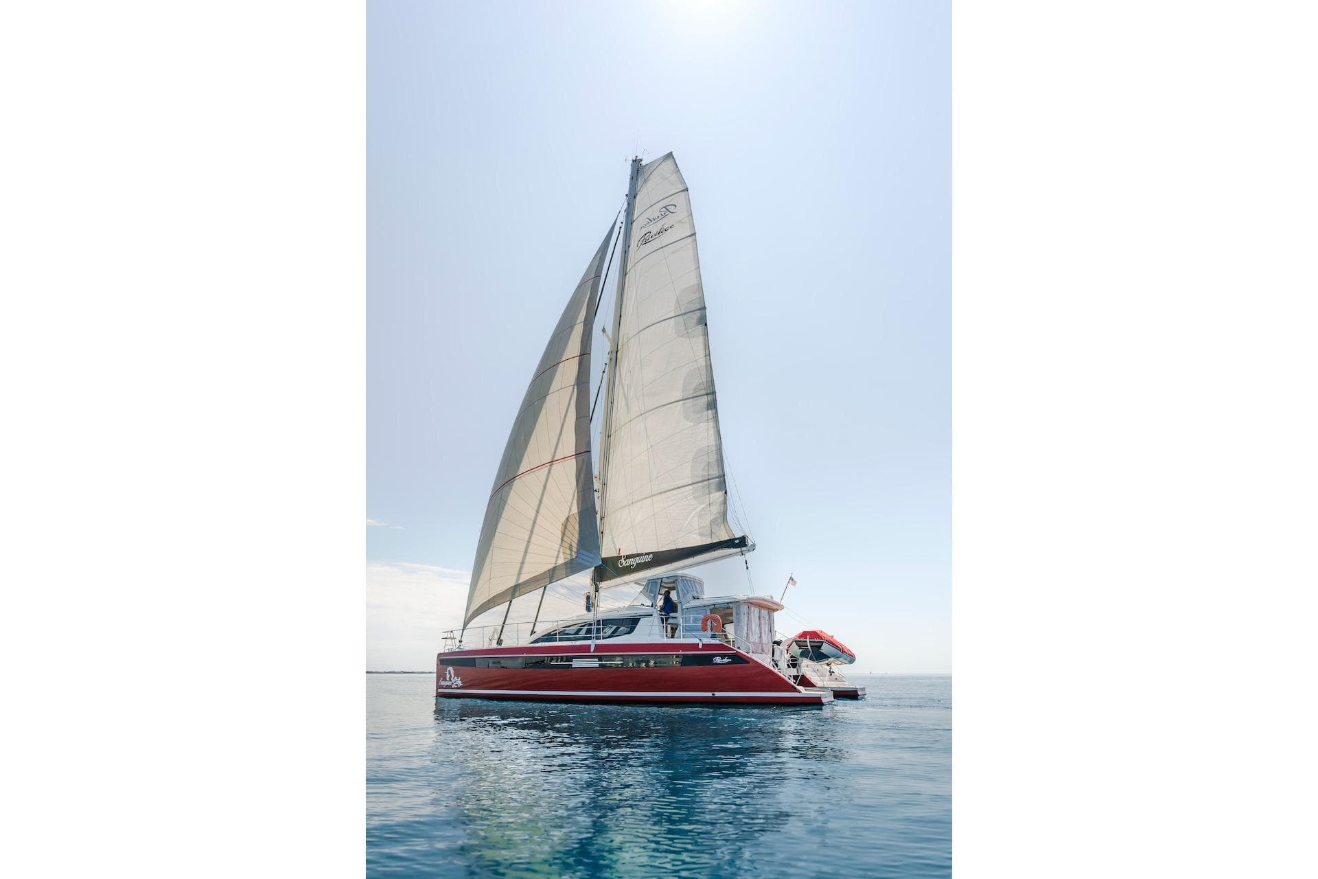 2025 Privilege Signature 510 catamaran sailing on calm waters.
