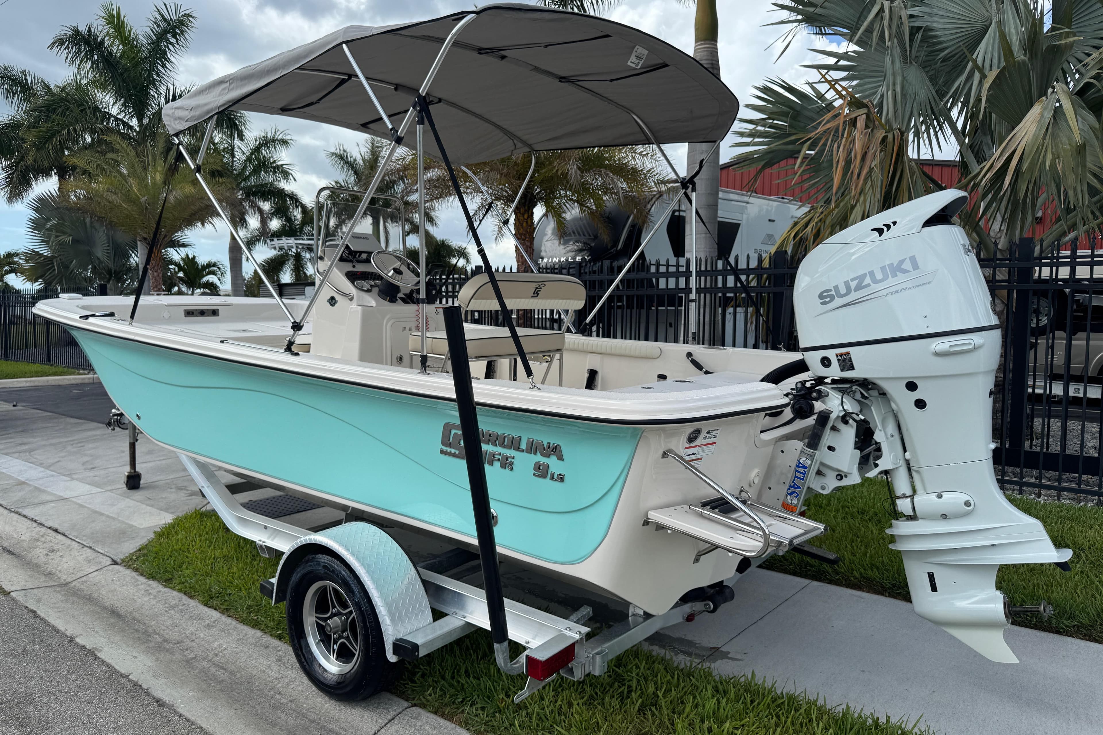 2022 Carolina Skiff 19 LS boat with Suzuki outboard motor on trailer.