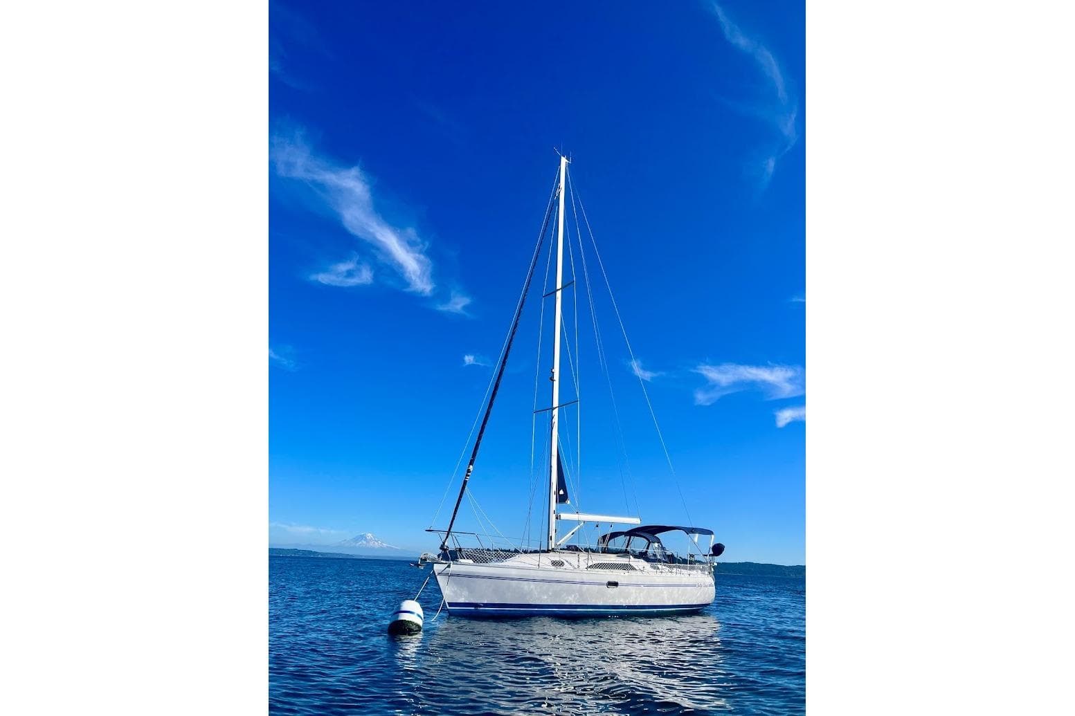 Sailboat Catalina 355 (2012) on calm blue water under clear sky.